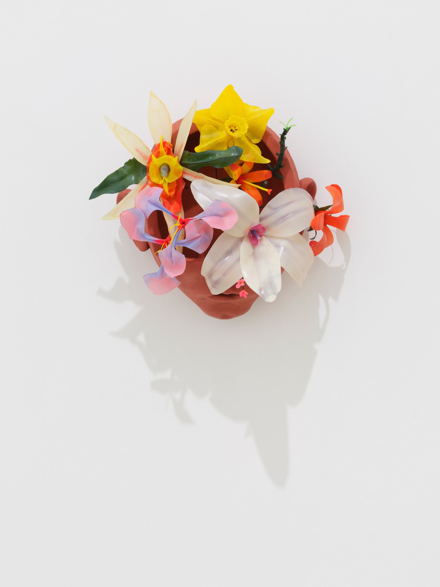 The boy with many friends, 2024, burned clay, shape-memory polymer, wire, 26 x 35 x 20 cm