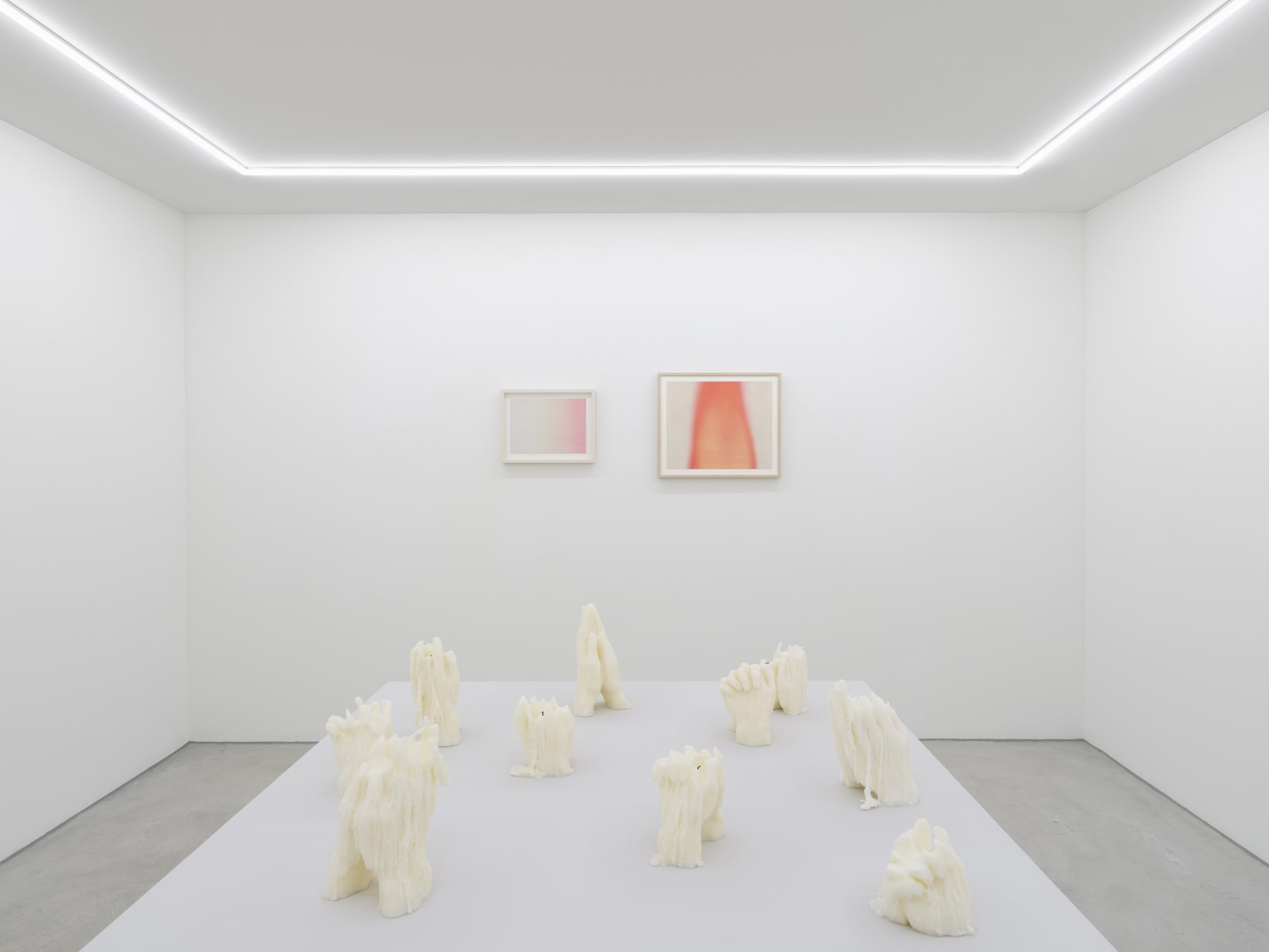 Works on paper, each, Drawing for Glowing Hour, 2023, oil on paper, various sizes In dialogue with sculptures, each, Look at This Unbearable Darkness, 2024, wax, various dimensions