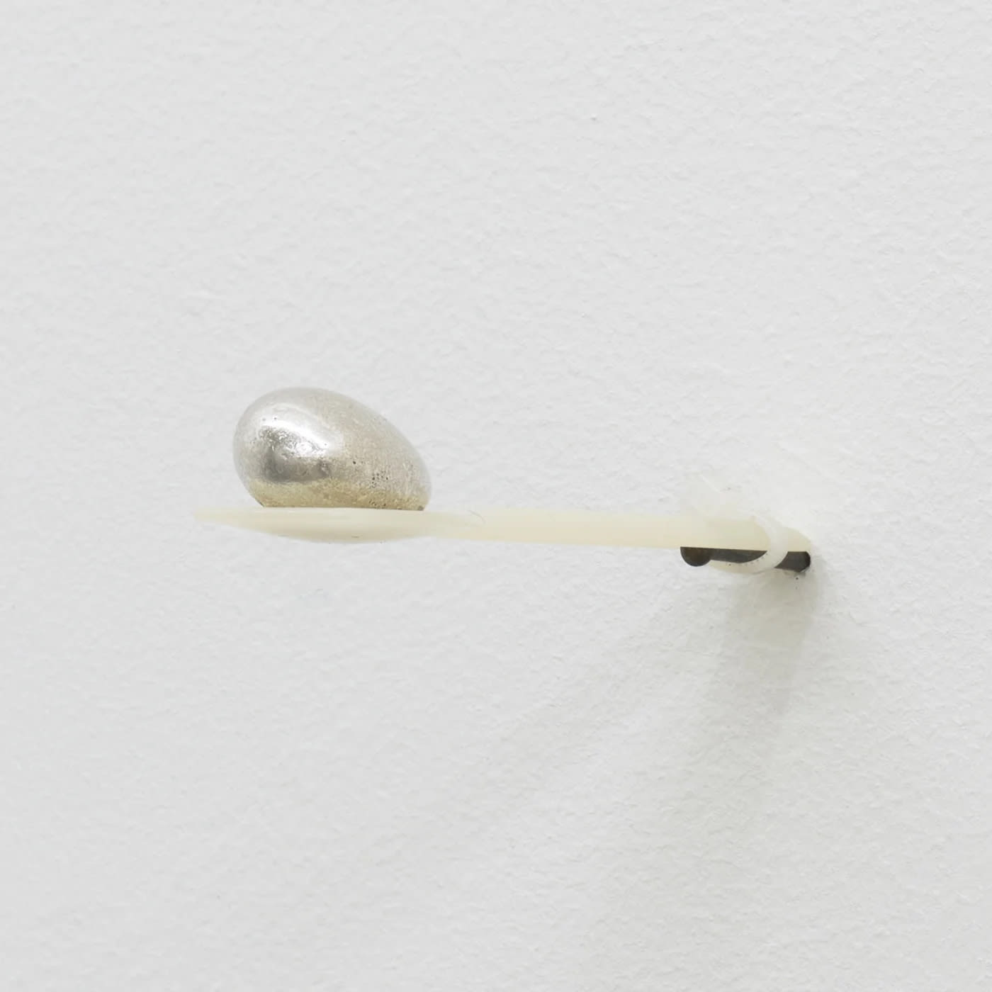 SANNA HELENA BERGER, Zum Thema, nail, plastic cable tie, biodegradable spoon 9.5 cm x 2.1 cm, sterling silver almond 2.5 x 1.5 x 1 cm, Ed 1/7 & 3 AP