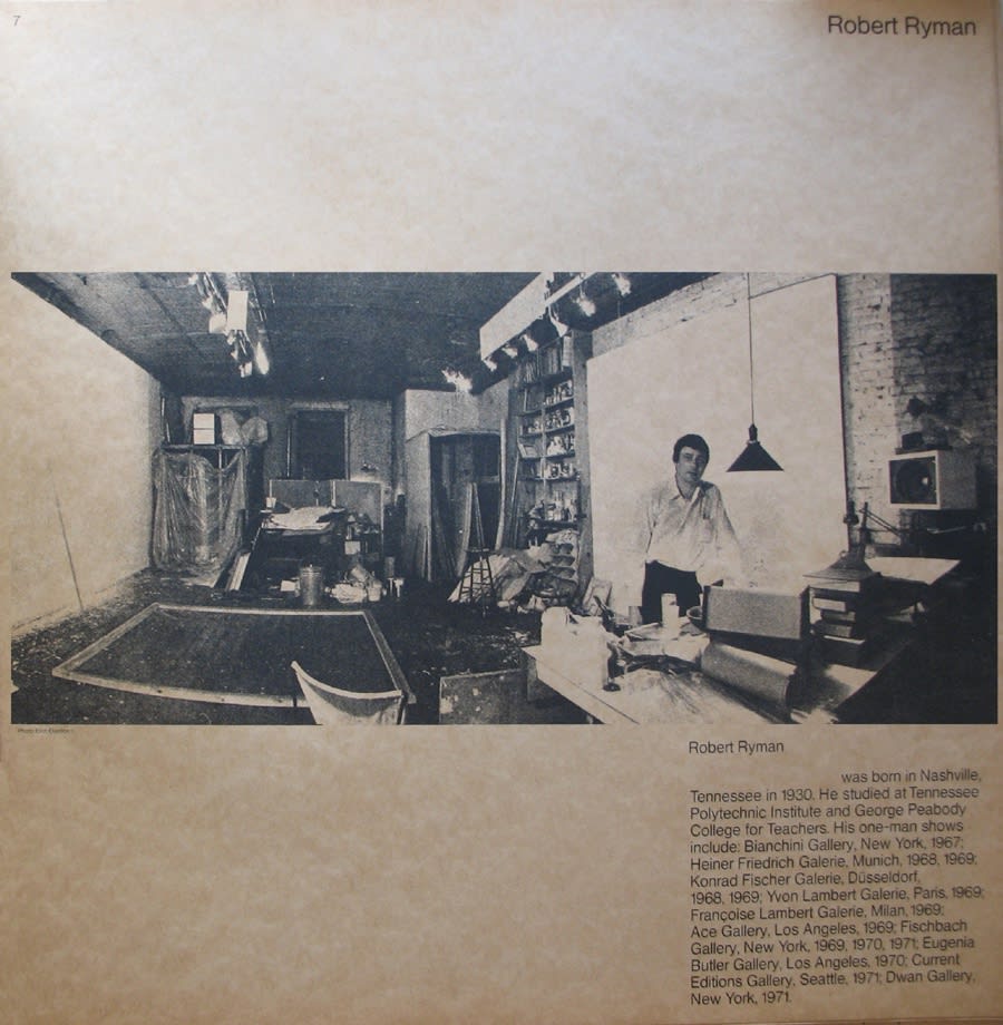 Black and white photograph of Robert Ryman in his studio with text underneath