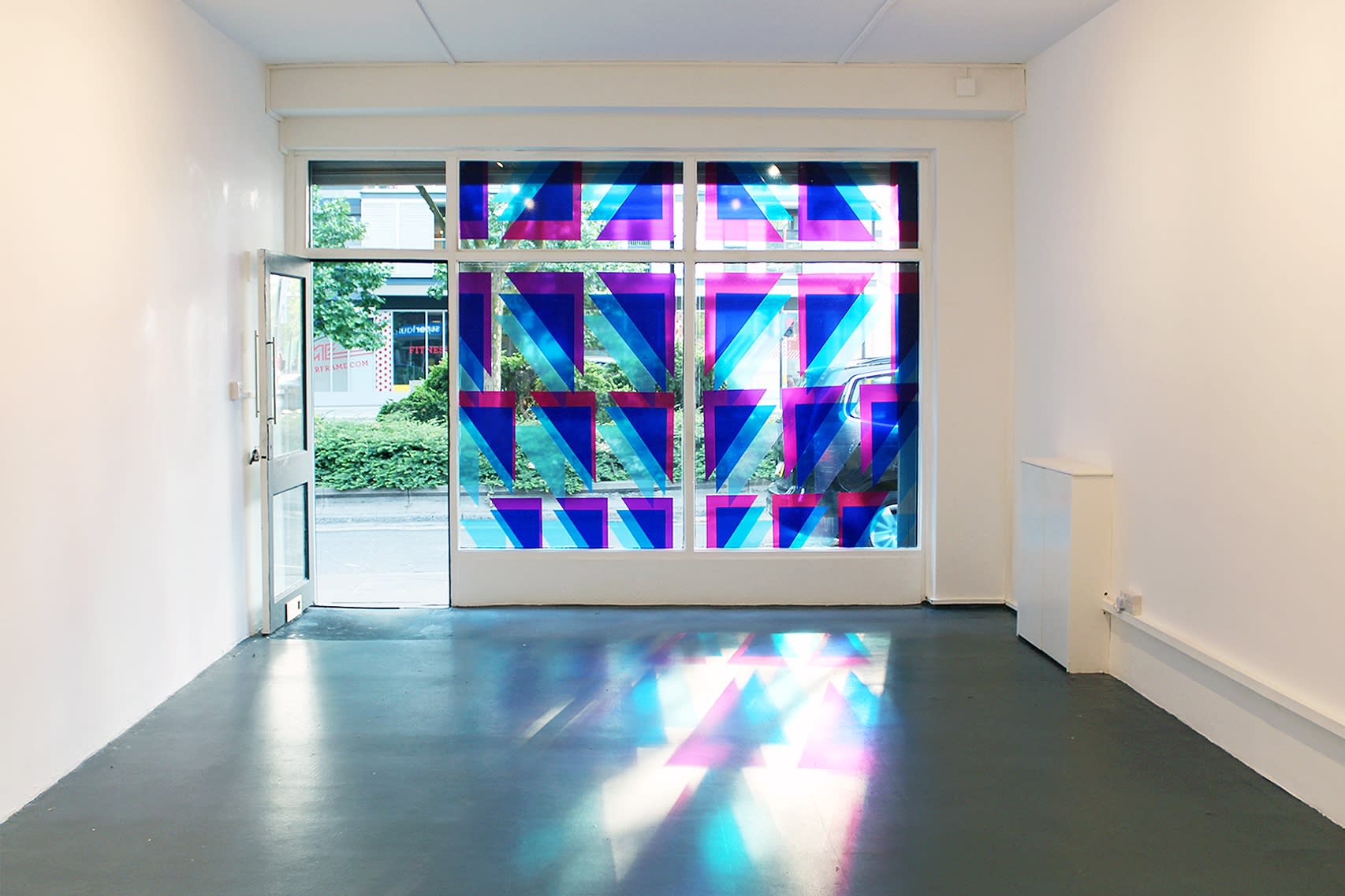 Fiona Grady, Umbra Slip, 2017, site-specific vinyl window installation, dimensions vary