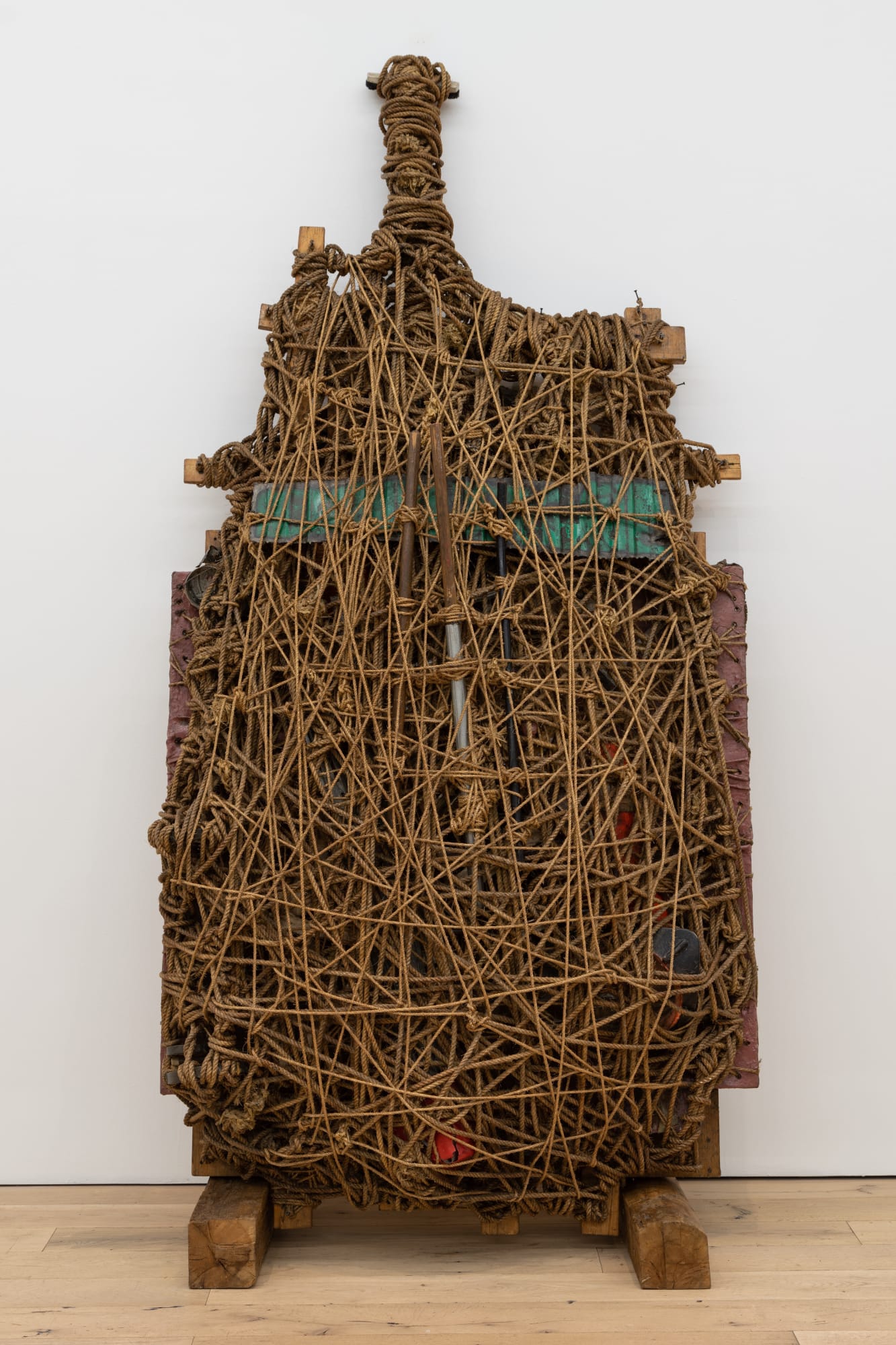 Lucy Fradkin Meets John Delapa Or Gregor, 1989 - 1992 Rope, wood, glue, paint, metal, and objects 112 x 55 x 24 in 284.5 x 139.7 x 61 cm