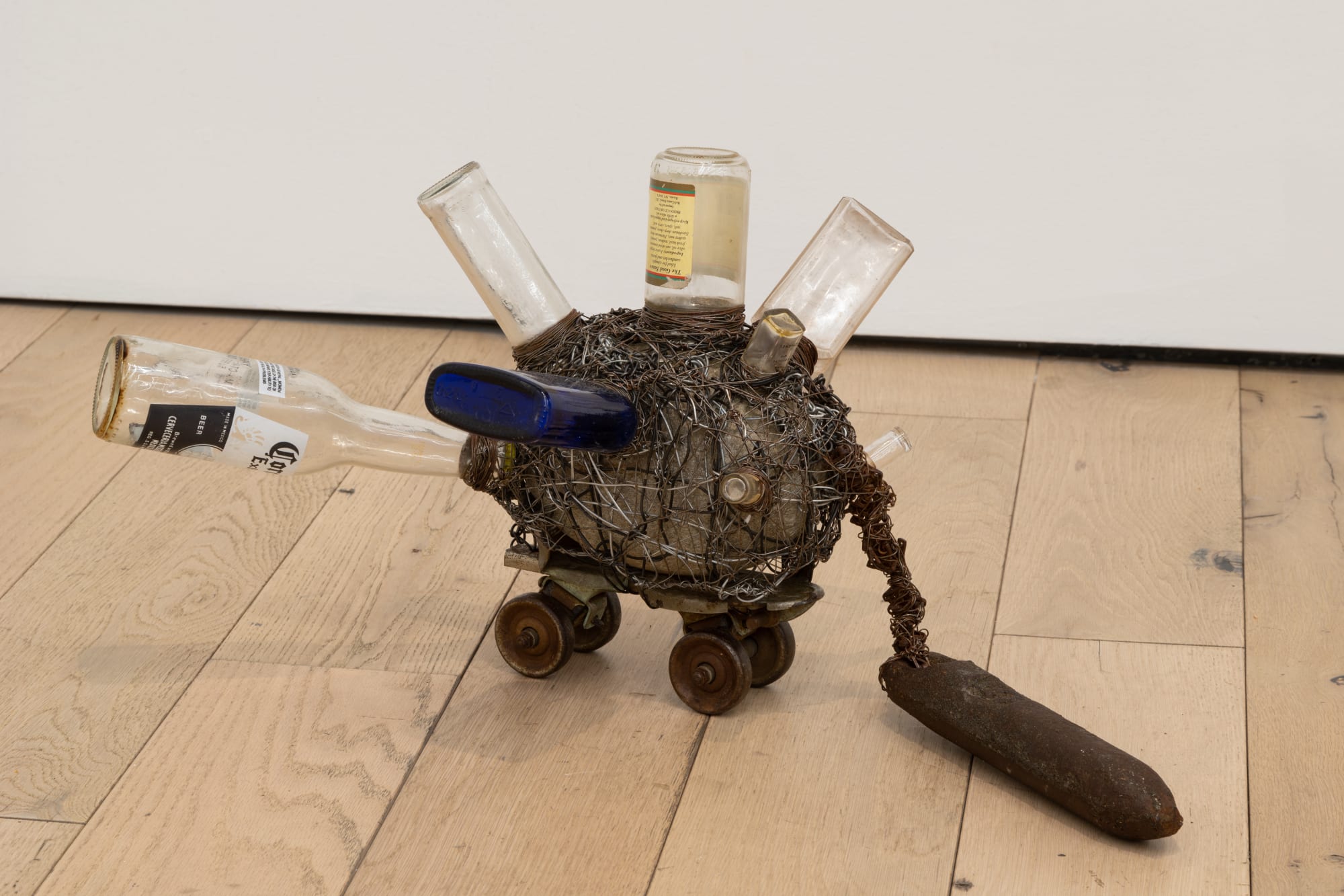 Chariot, 2006 Metal, wire, bottles, and rollerskate 13 x 9 x 27 in 33 x 22.9 x 68.6 cm