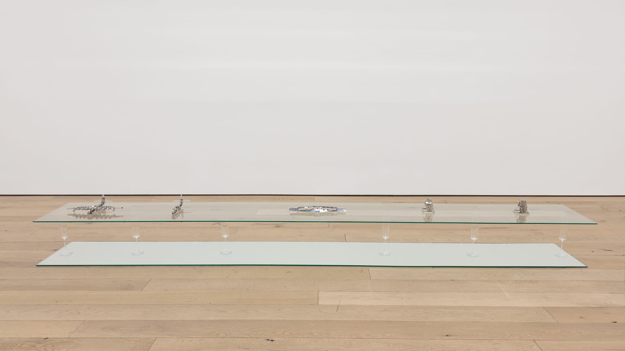 i’ll go on losing millions it’s just what i do, 2020 glass, mirror, Crate and Barrel champagne glasses, Timeformachine Heavenly Hercules model airplanes 15 x 120 x 16 inches