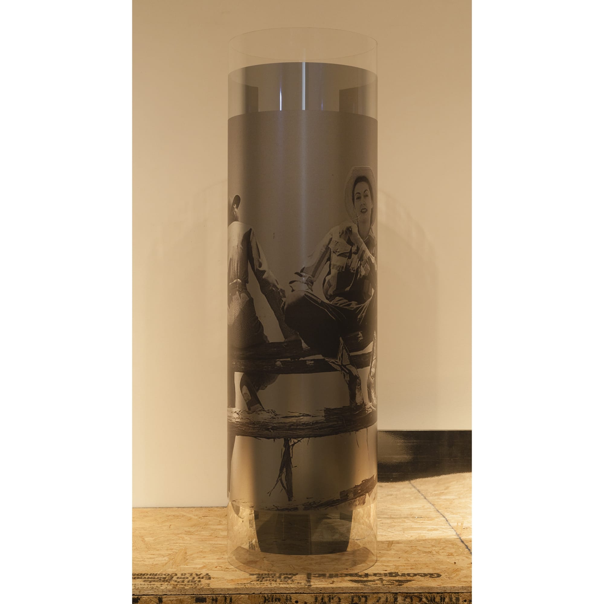 Servane Mary Untitled (American Cowgirl of the 40's I), 2015 inkjet print on window film, plexiglass tube 51 x 12 inches