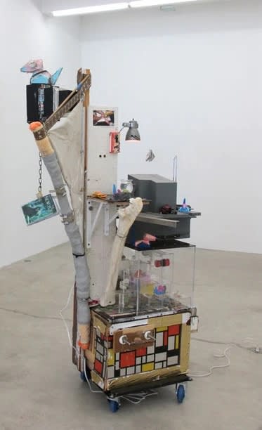 Justin Lieberman Storygon Studio, 2012 mixed media including ceramics Porygons, taxidermy crabs, 13 artist books, audio cassettes, cds, thigh bone of giraffe, electricity, and a painting 85 x 34 x 45 inches