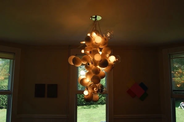 Guyton/Walker Untitled, 2011 38 coconuts, electrical wiring, light bulbs 43 x 29 x 23 in