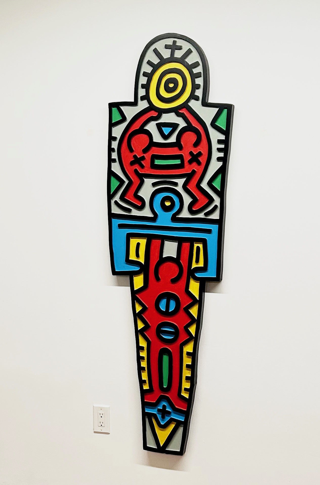 Keith Haring Totem, 1988-89 Carved plywood painted with enamel in colors. A printer’s proof aside from the edition of 35 (PP 1 / 2) 72 x 22 x 2 in 182.9 x 55.9 x 5.1 cm (KH_329)