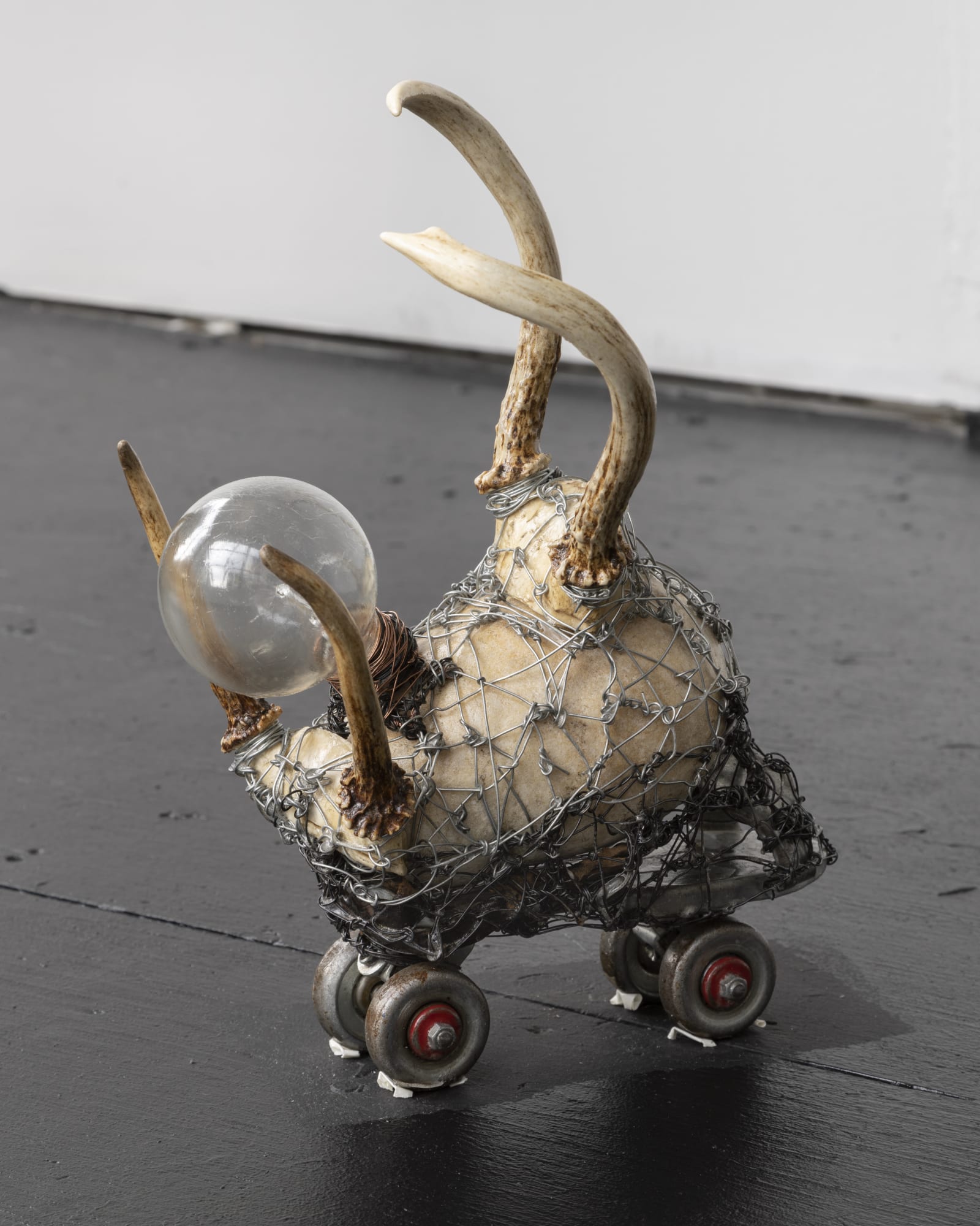 Arthur Simms Beetle, 2015 Horns, wire, light bulb, roller skate, rock, and leather 15 x 12 x 7 in 38.1 x 30.5 x 17.8 cm