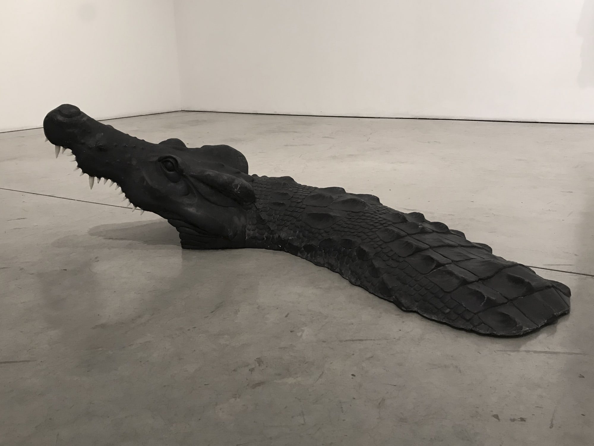 Ronald Ventura Crocodile 2018 Fiberglass, charcoal, polyurethaine paint 40 x 40 x 136 cm