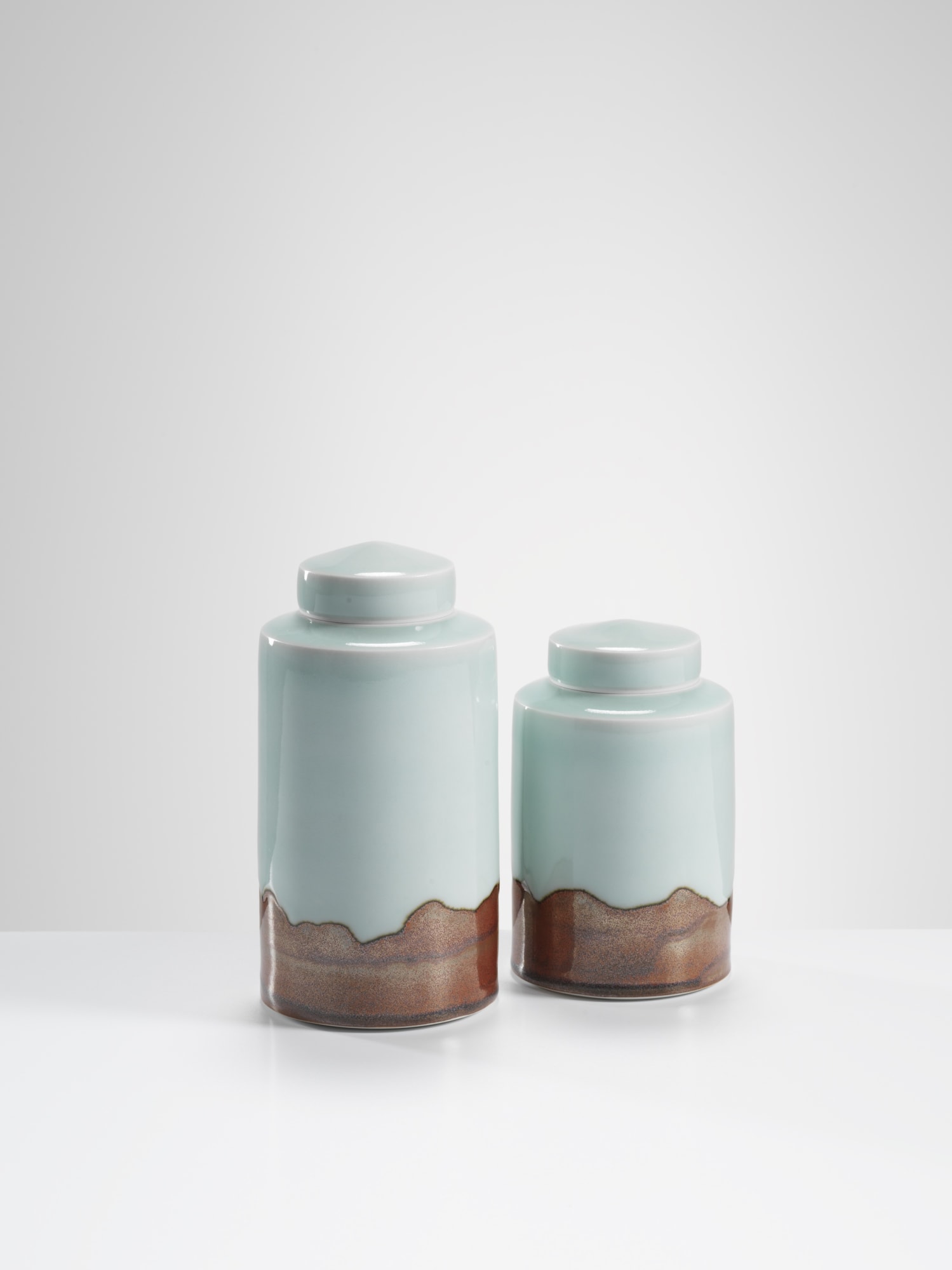 Chris Keenan, 43-44 Celadon lidded jars with red ‘vista’