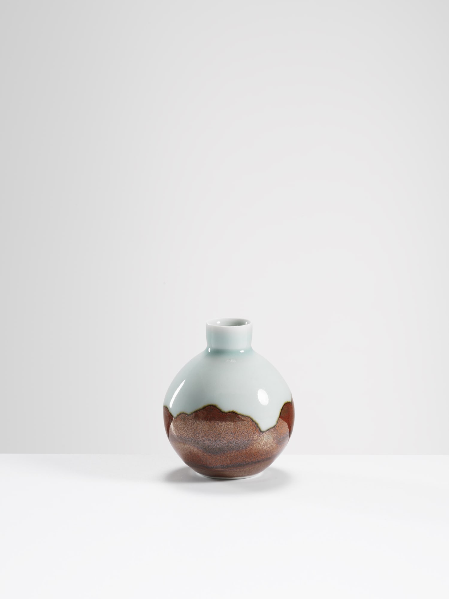 Chris Keenan, 73 Celadon and red globe vase