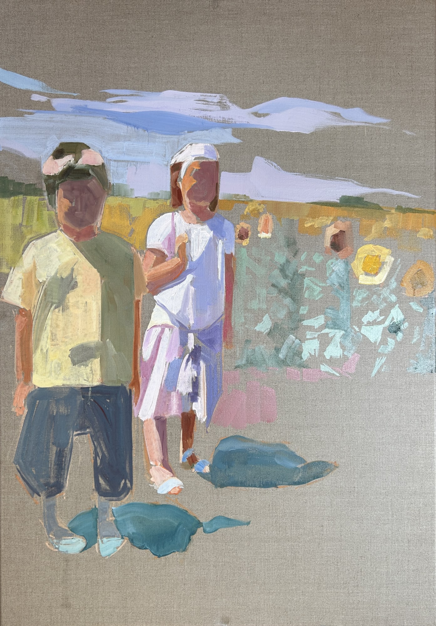 two children abstracted in the summer in a landscape with sunflowers