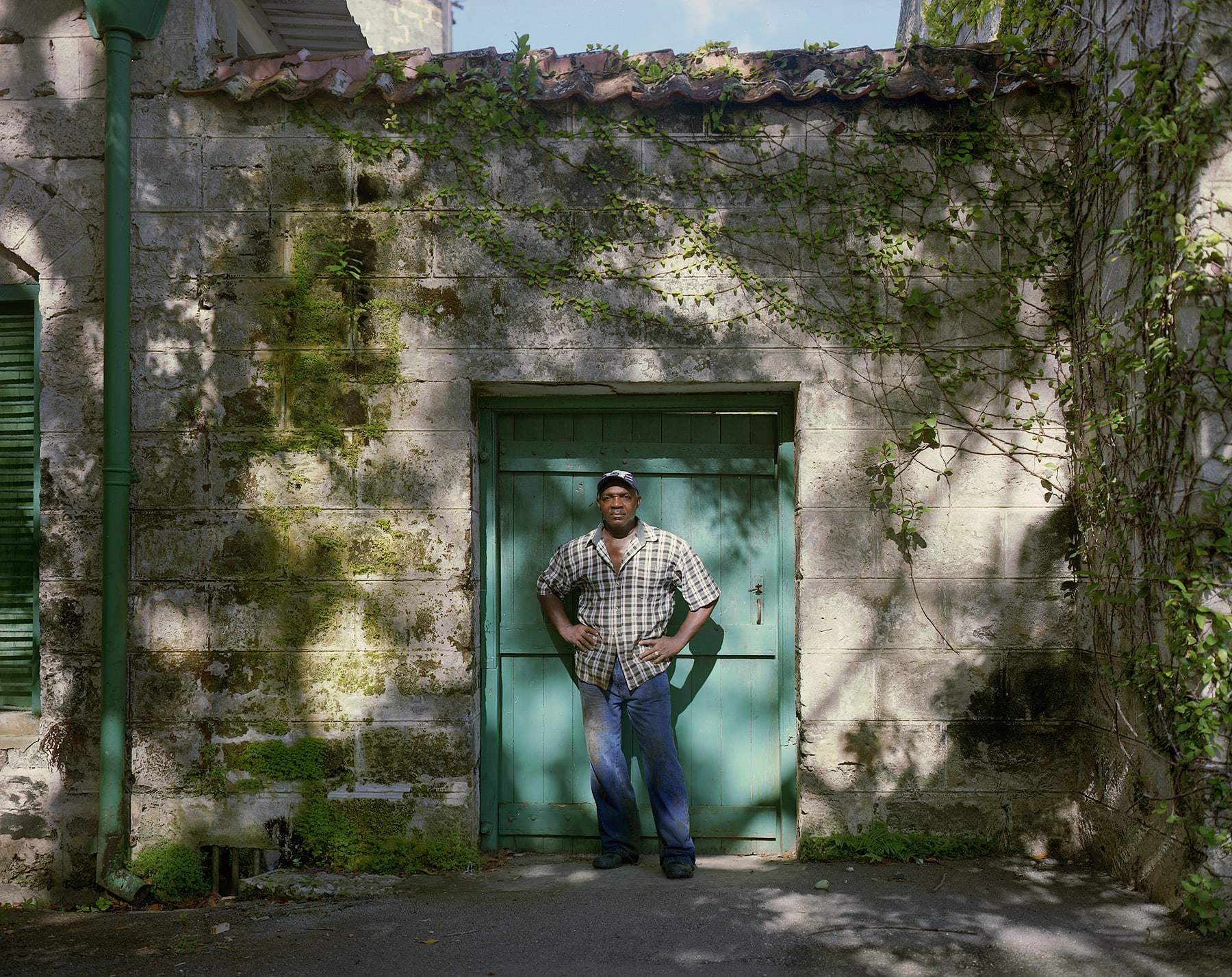 Hector by Door to Tractor Yard, Brighton Farm, St. George, Barbados, 2007 Archival Pigment Print on Moab Entrada Rag, 17x21" Edition of Three