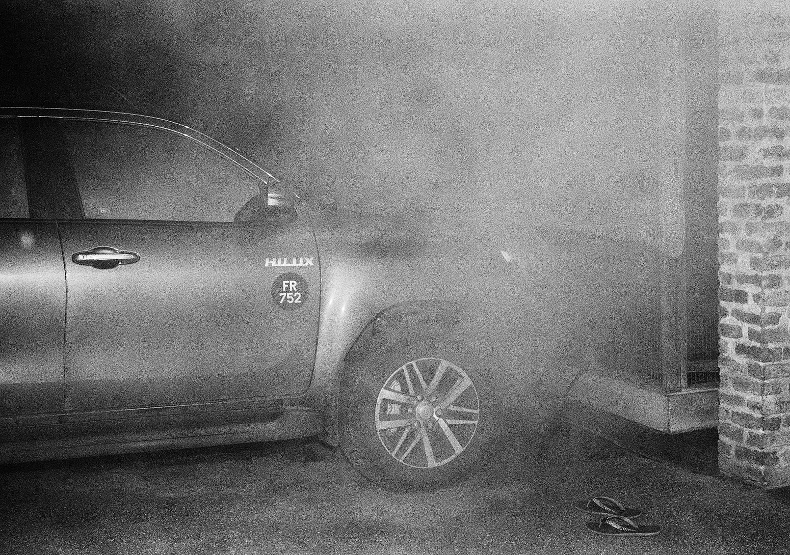 Fumigating to Prevent Mosquitoes Spreading Dengue Fever, Brighton Farm, St. George, Barbados, 2016 Selenium Toned Silver Gelatin Print, 16x20" Archival Pigment Print on Moab Entrada Rag, 17x21" Edition of Three
