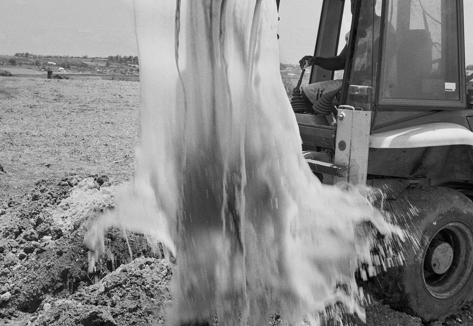 Repairing Broken Water Pipe, Brighton Farm, St. George, Barbados, 2010 Selenium Toned Silver Gelatin Print, 16x20" Archival Pigment Print on Moab Entrada Rag, 17x21" Edition of Three