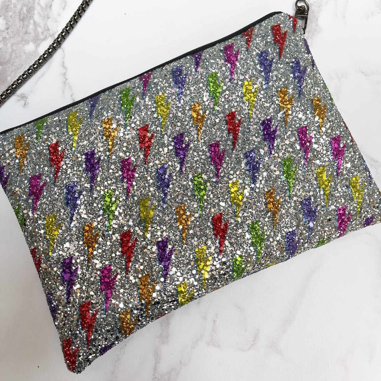 Petit DunnocksMulti Bolt Tag Glitter Clutch Bag, gunmetal 120cm long chain 13x18cm £37