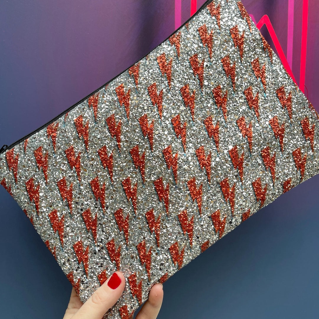 Petit Dunnocks Multi Bolt Tag Glitter Clutch Bag, gunmetal 120cm long chain 18x28cm £50