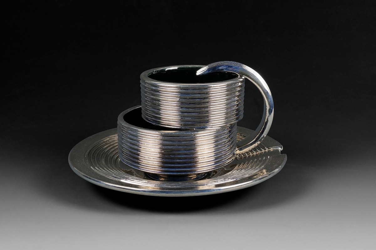 Displaced Cup, Saucer, 2021 Artwork is stamped on the bottom Platinum Luster Glaze, Earthenware