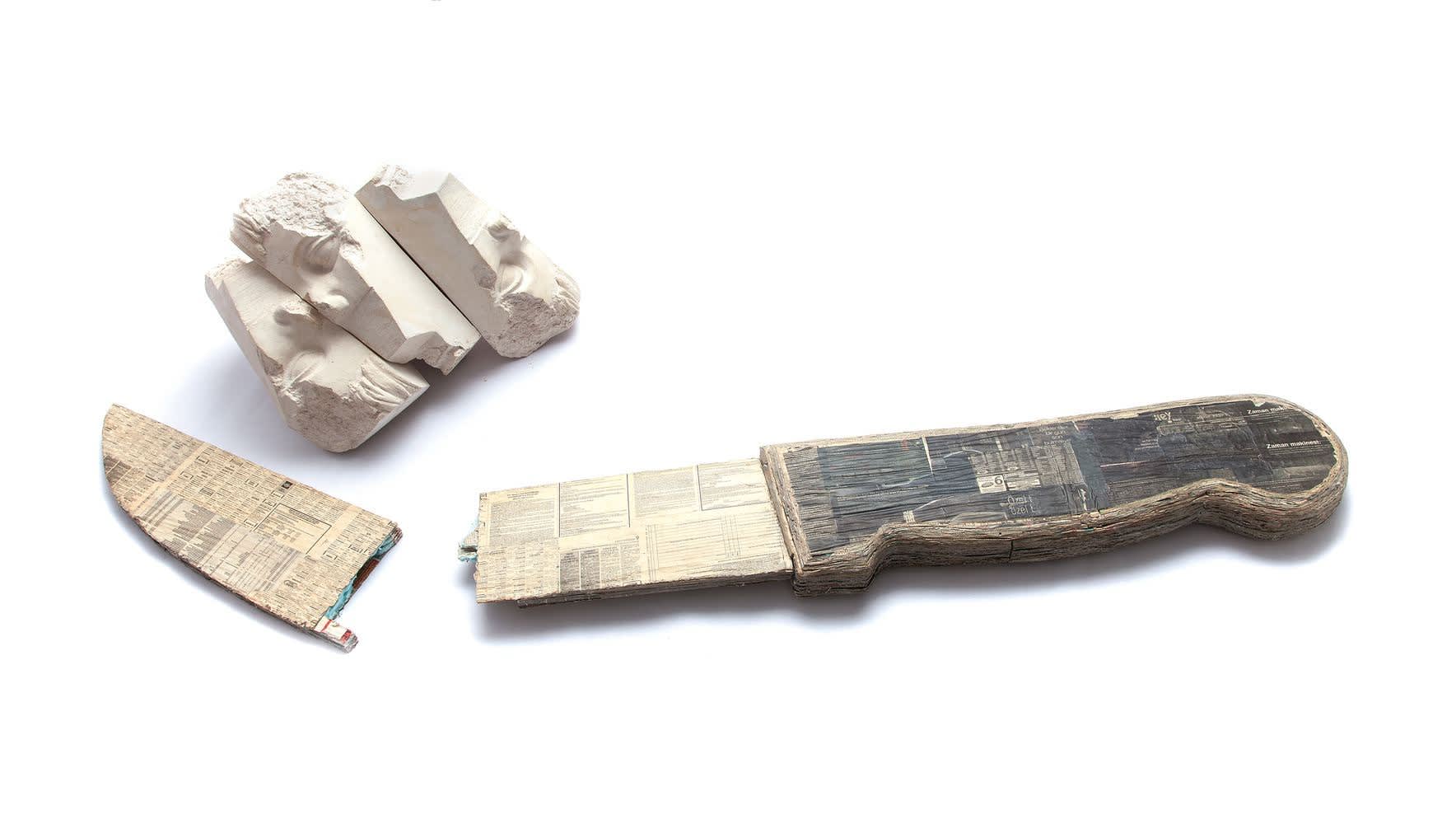 Cut, 2016 installation on plaster and newspaper