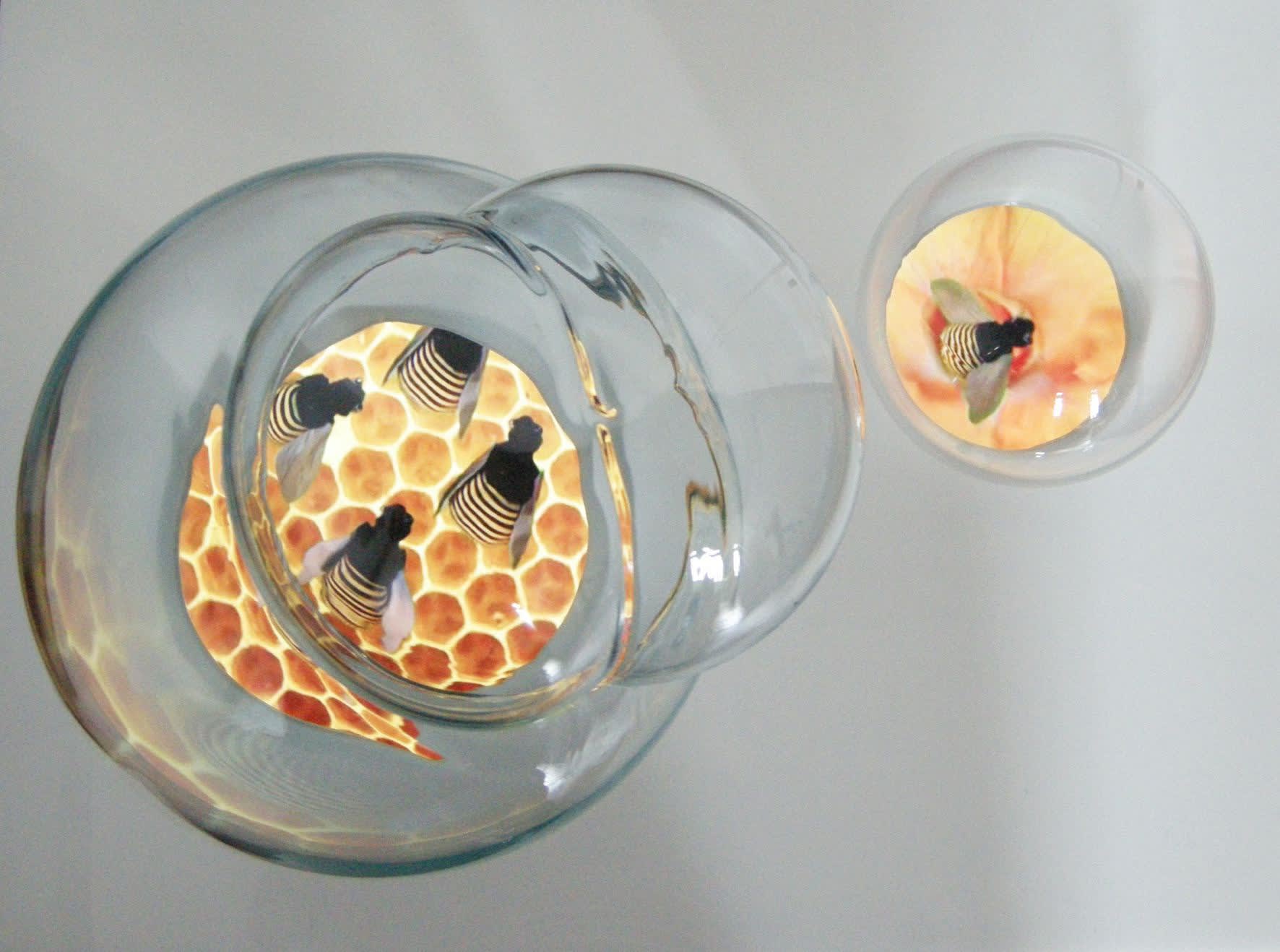 To Whom Does The Air Belong To?, 2014 Signed and editioned verso Two-channel video composition, 6:20 minutes, looped Hand-blown glass bubbles with video screen embedded in white acrylic