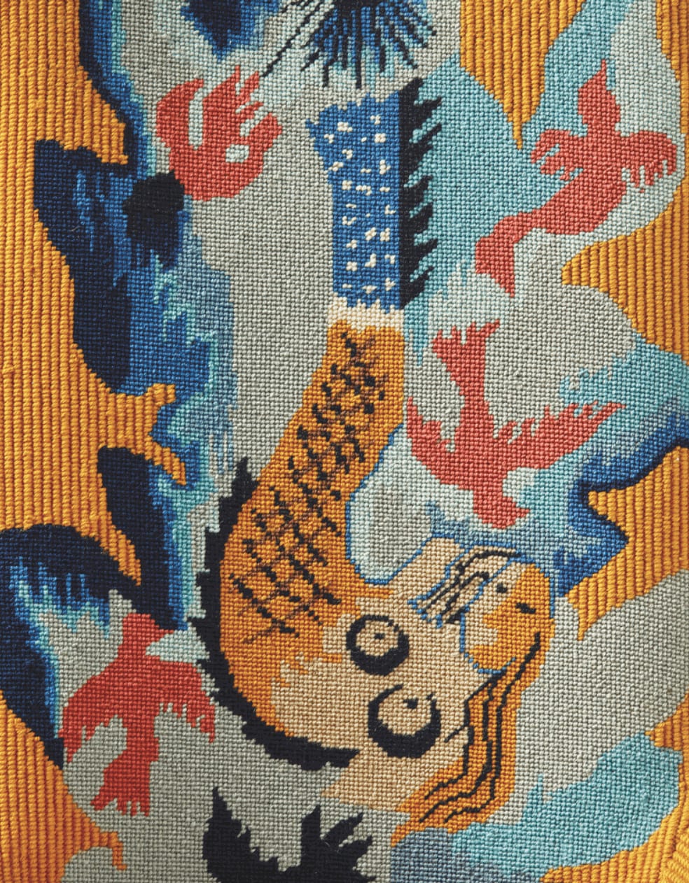 Detail of Jean Lurçat needlework design on bergère ‘MF1002’ by Pierre Chareau. Image Christie's.