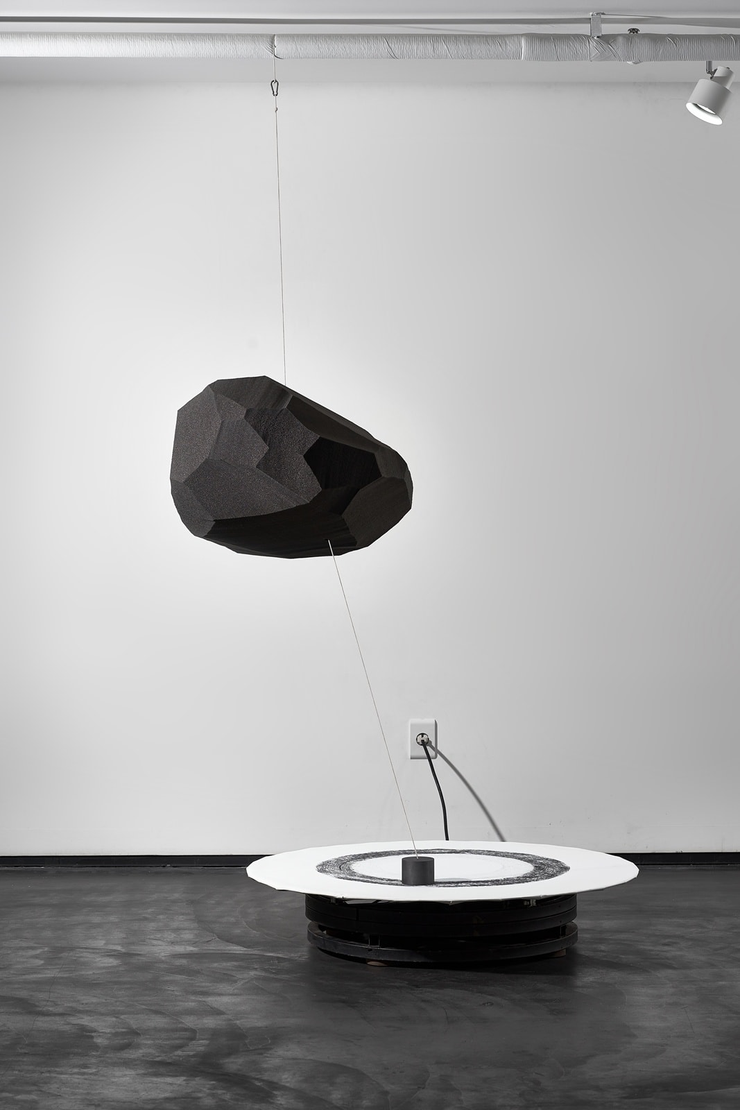 Loading process 03 sponge, iron, magnet, graphite, motor 80 x 80 x 300cm 2022