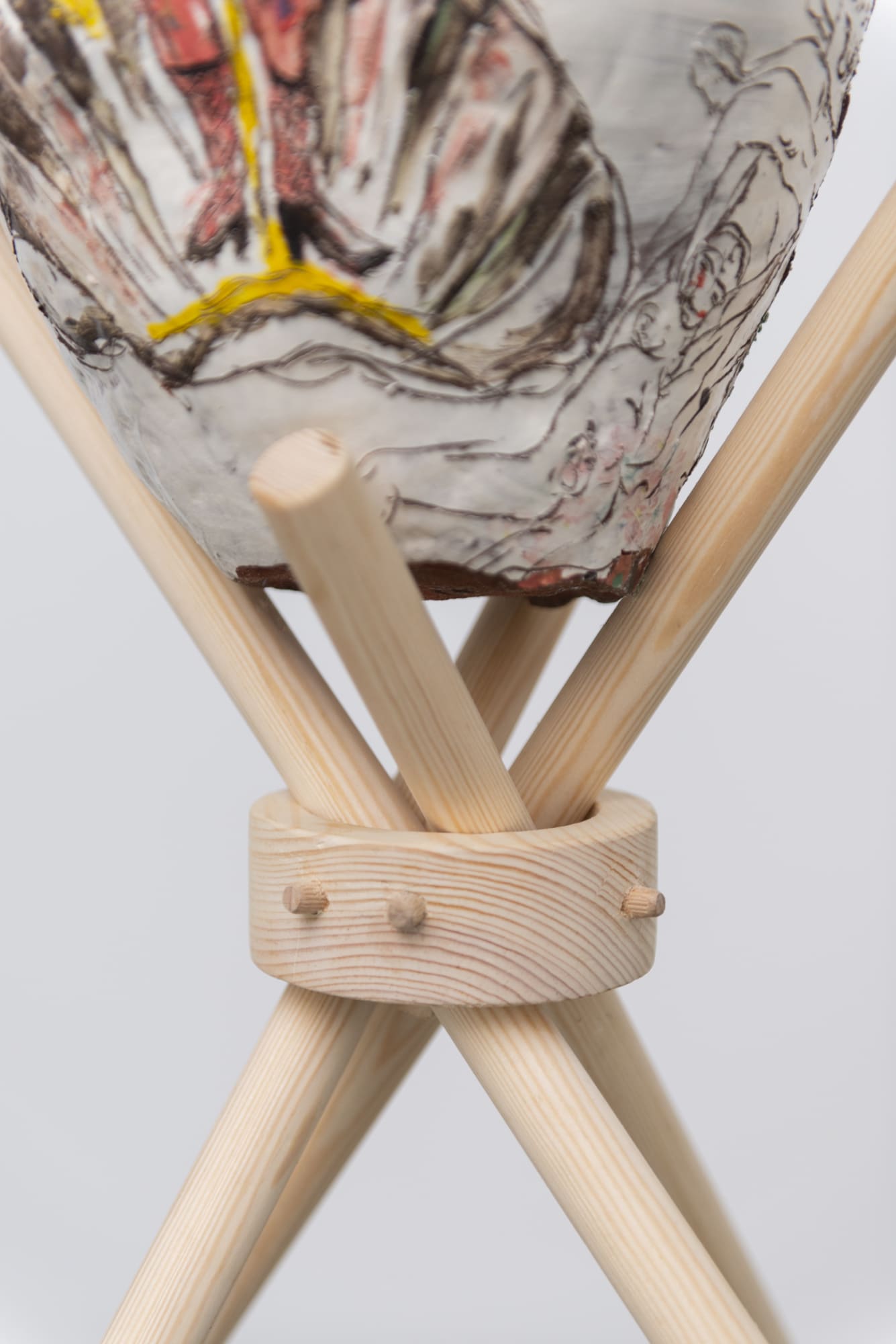 Detail of an installation from Karim Boumjimar’s Mouths, Vessels, Portals (2025), combining chalk drawings on canvas with ceramic forms.