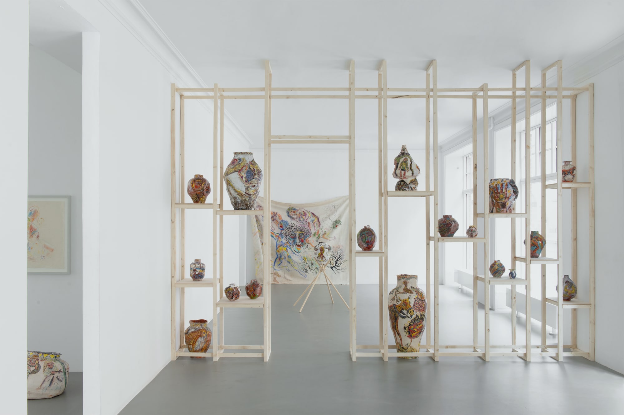 Exhibition view of Mouths, Vessels, Portals by Karim Boumjimar at Alice Folker Gallery, showing colorful earthenware sculptures displayed in the gallery space.