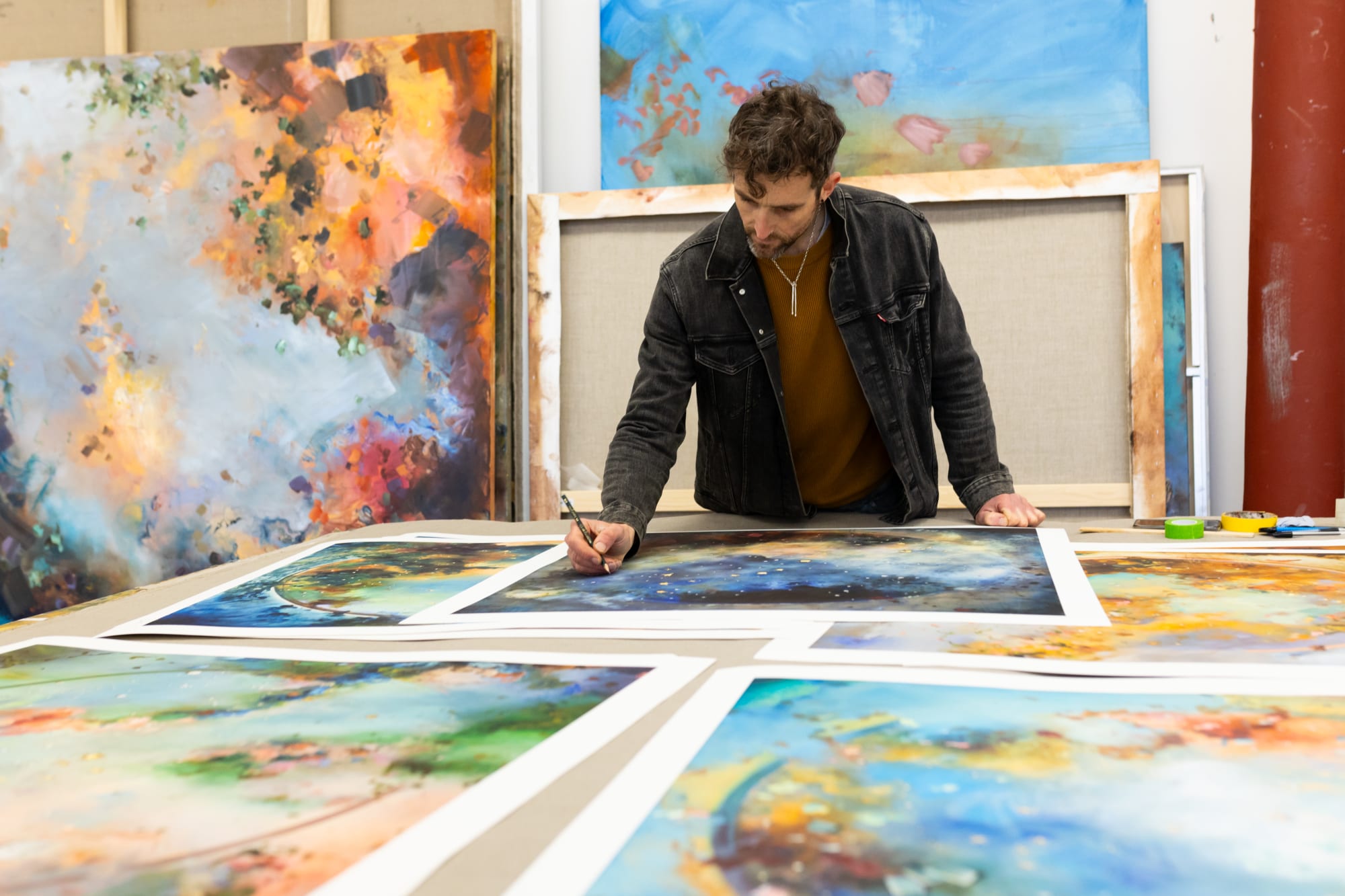 Chris Rivers signing his Scorpio Starmap print