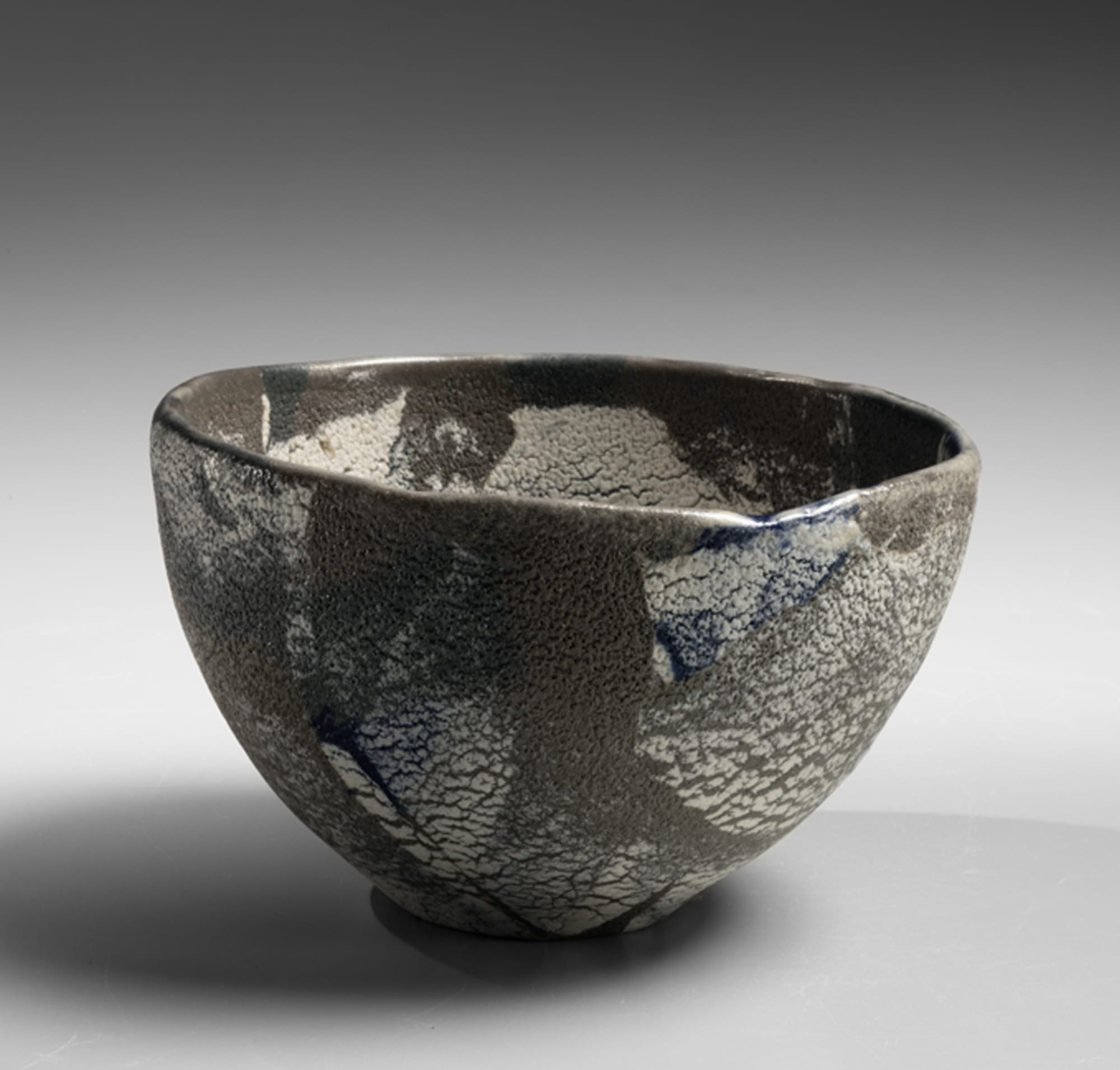 Matsui Kōsei Neriage teabowl with clay-slip-paint on layered and fissured surface ca. 1980 Slip-painted stoneware 3 1/8 x 5 1/8 x 5 in. Inv# 9950 SOLD