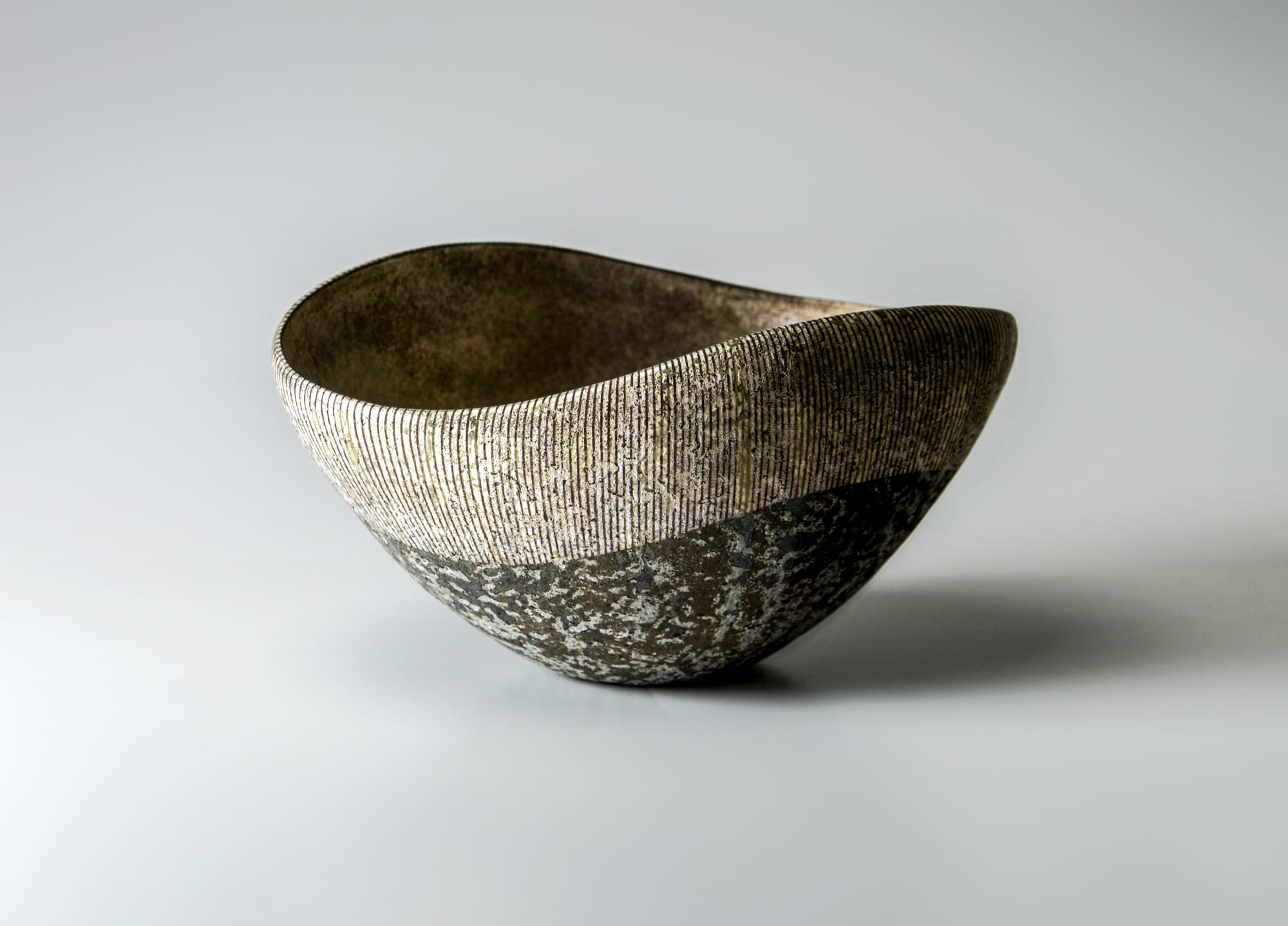 Iguchi Daisuke Two tone bowl with silver striation pattern 2017 Ash-coated stoneware with silver slip 5 x 9 1/2 x 7 in. Inv# 10372 SOLD