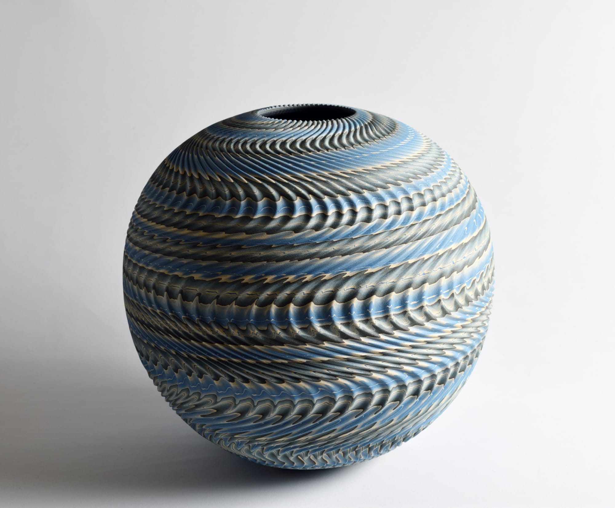 Ogata Kamio (b. 1949) Neriage (marbleized) vessel with carved, ridged surface titled " Rinpa" 2019 Marbleized stoneware with transparent matte glaze 12 1/8 x 12 5/8 x 12 5/8 in. Inv# 11054 SOLD