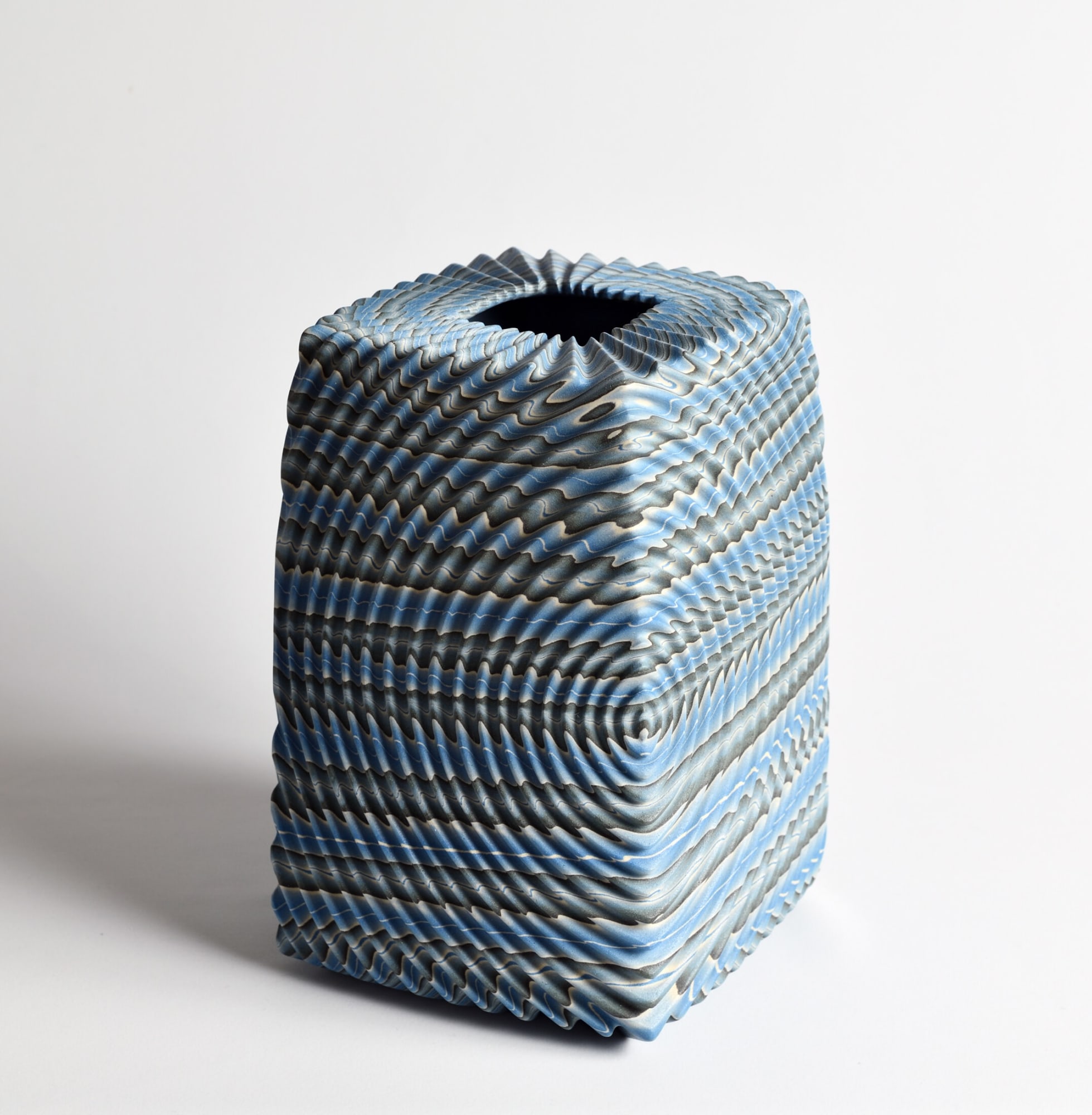 Ogata Kamio (b. 1949) Neriage (marbleized) vessel with carved, ridged surface and recessed square mouth titled &ldquo;Waves&rdquo; 2019 Marbleized stoneware with transparent matte glaze 9 x 6 1/4 x 6 1/4 in. Inv# 11061 SOLD