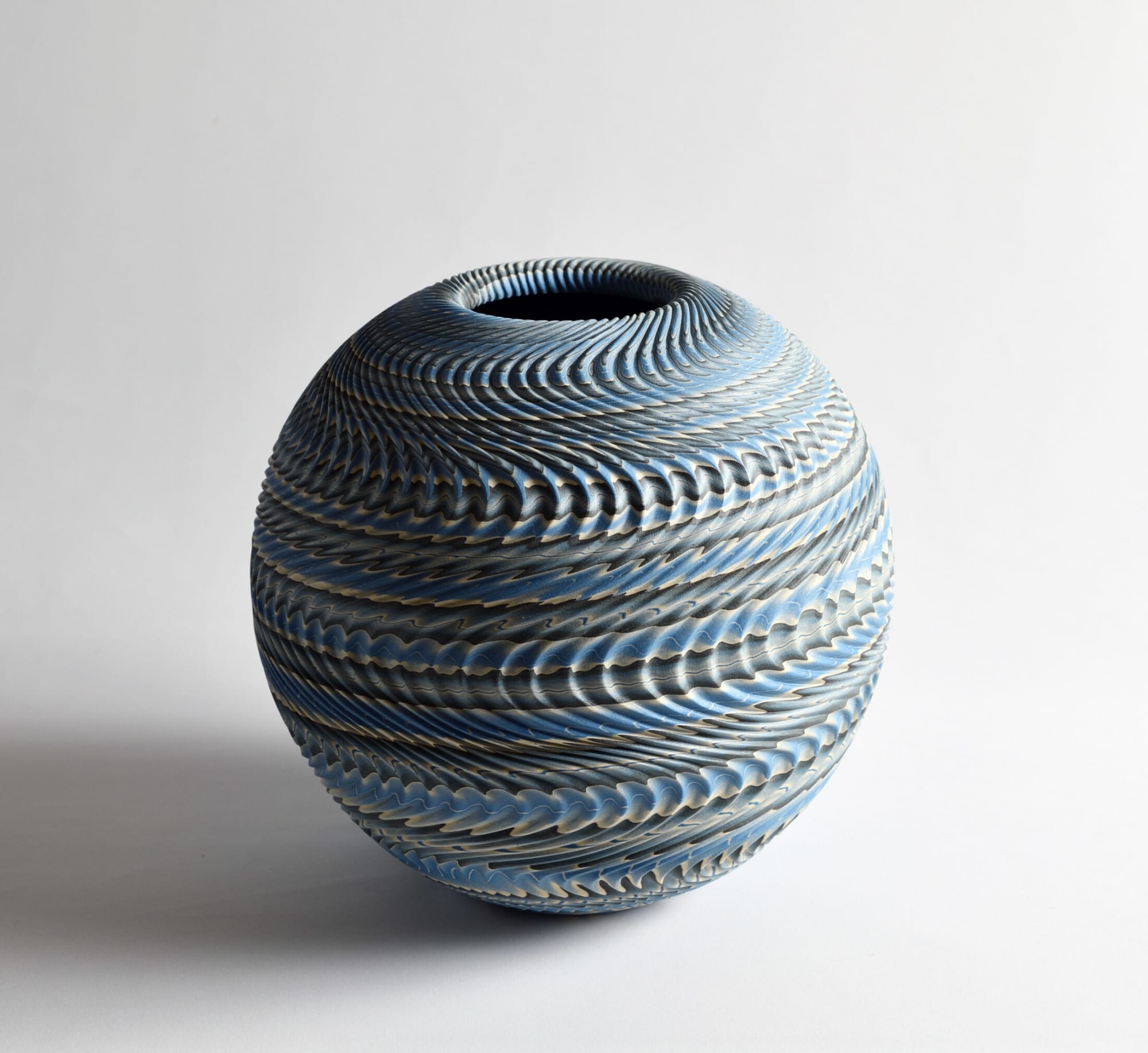 Ogata Kamio (b. 1949) Neriage (marbleized) vessel with carved, ridged surface and recessed mouth titled &ldquo;Rinpa&rdquo; 2019 Marbleized stoneware with transparent matte glaze 9 1/4 x 9 1/2 x 9 1/2 in. Inv# 11064 SOLD