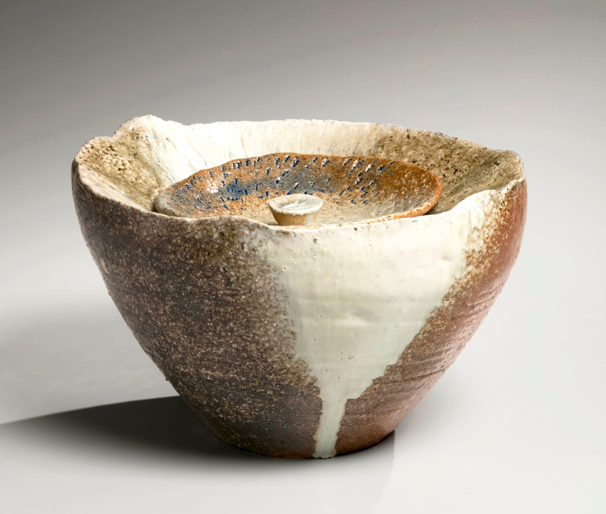 NISHIHATA TADASHI (b. 1948) Round slightly conical waterjar, covered with Tamba ash glaze and matching lid with knob handle 2019 Tamba ash-glazed stoneware 7 x 11 3/4 x 9 in. Inv# 11082
