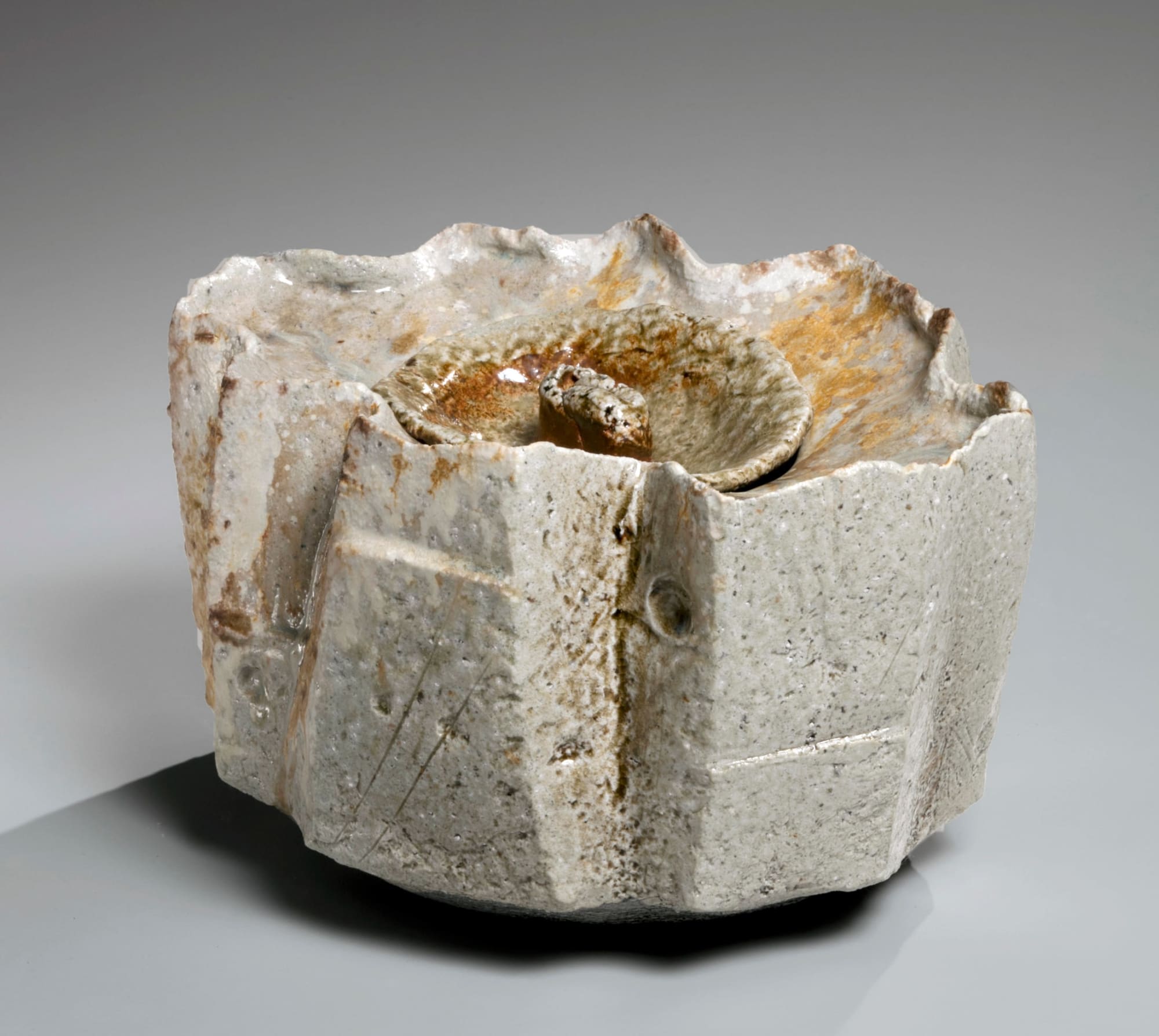 NISHIHATA TADASHI (b. 1948) Faceted waterjar with lid with knob handle, all covered with natural Tamba ash glaze 2019 Tamba ash-glazed stoneware 5 1/2 x 9 1/2 x 7 1/2 in. Inv# 11263