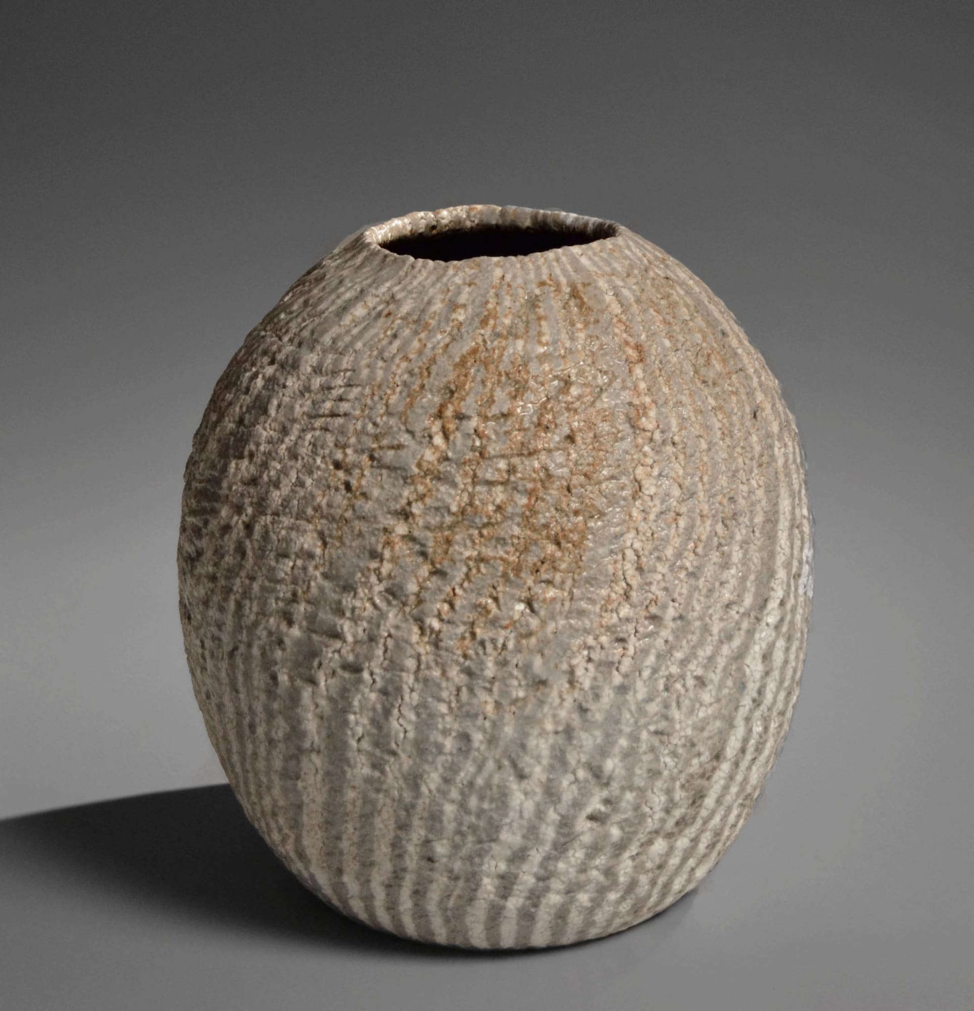 NISHIHATA TADASHI (b. 1948) Round neriage (marbleized) vessel with diagonal striation pattern, covered with Tamba ash glaze 2019 Tamba ash-glazed stoneware 11 1/4 x 10 7/8 in. Inv# 11266