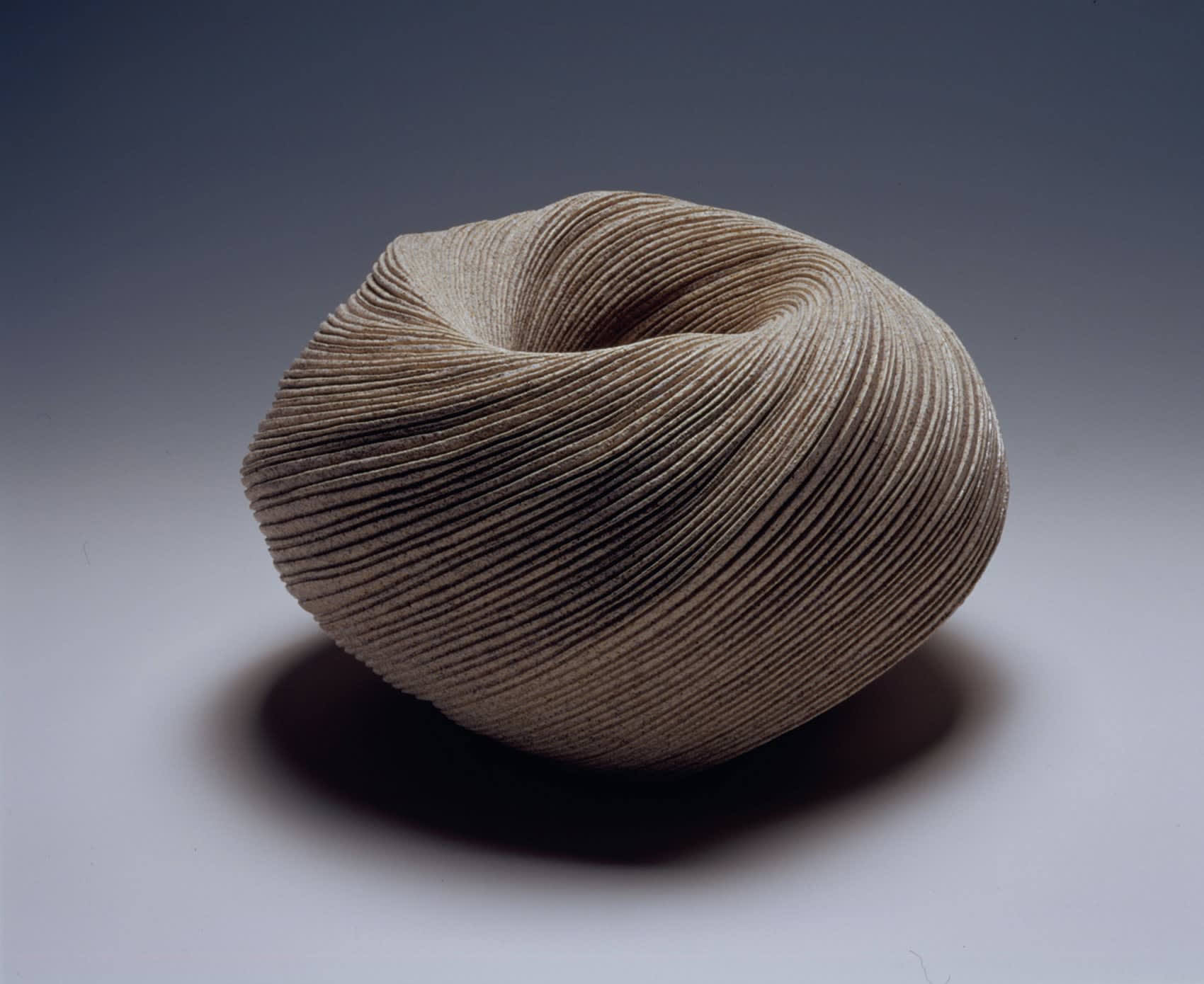 Ovoid vessel with diagonally incised cascading folds 2007 Stoneware 12 1/4 x 20 x 15 3/4 inches Inv# 5451