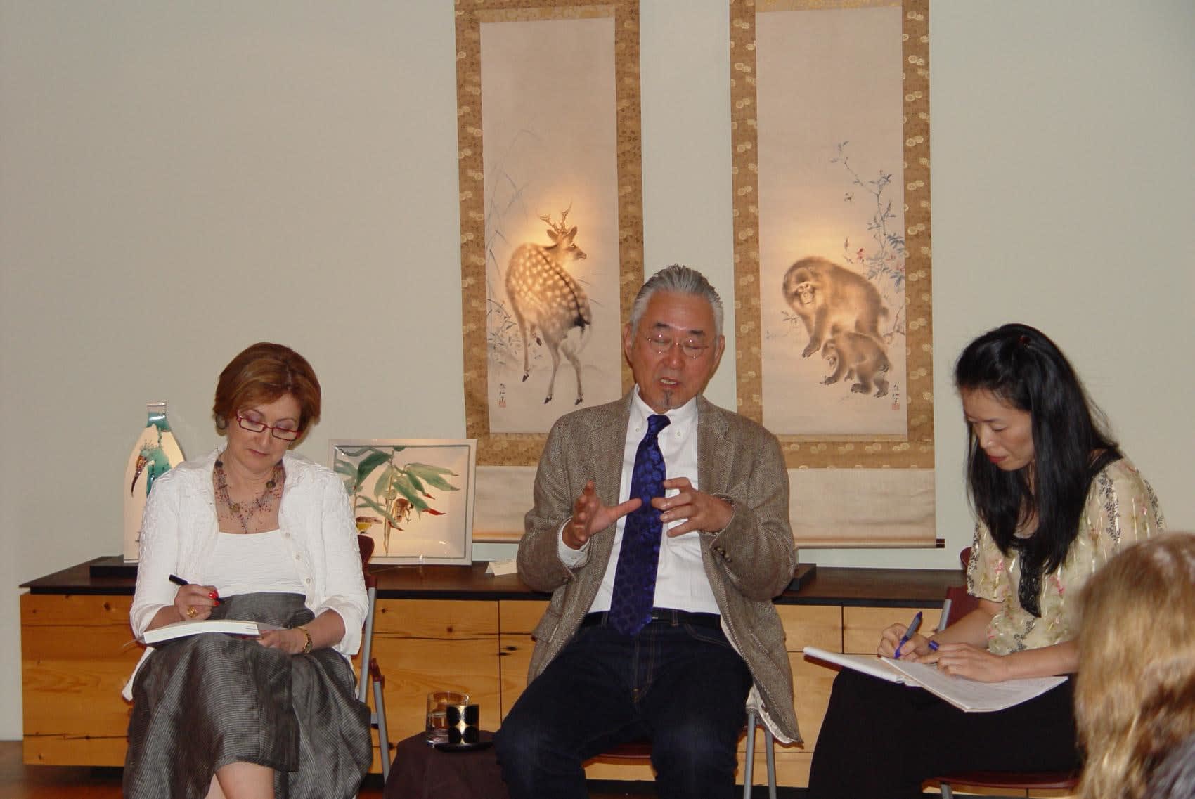 Takegoshi Jun discussing his artistic process during his Artist Talk with Joan Mirviss and translator Yasuko Otsue