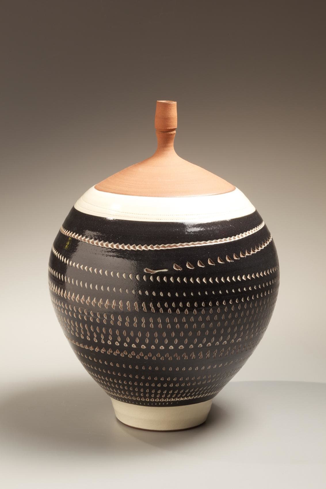 Kondô Yutaka (1932 - 1983) Black glazed stoneware vase with impressed and rouletted patterning and white slip inlay, 1973 Stoneware with black and white glazes 13 x 9 1/2 inches; Inv# 6643 SOLD
