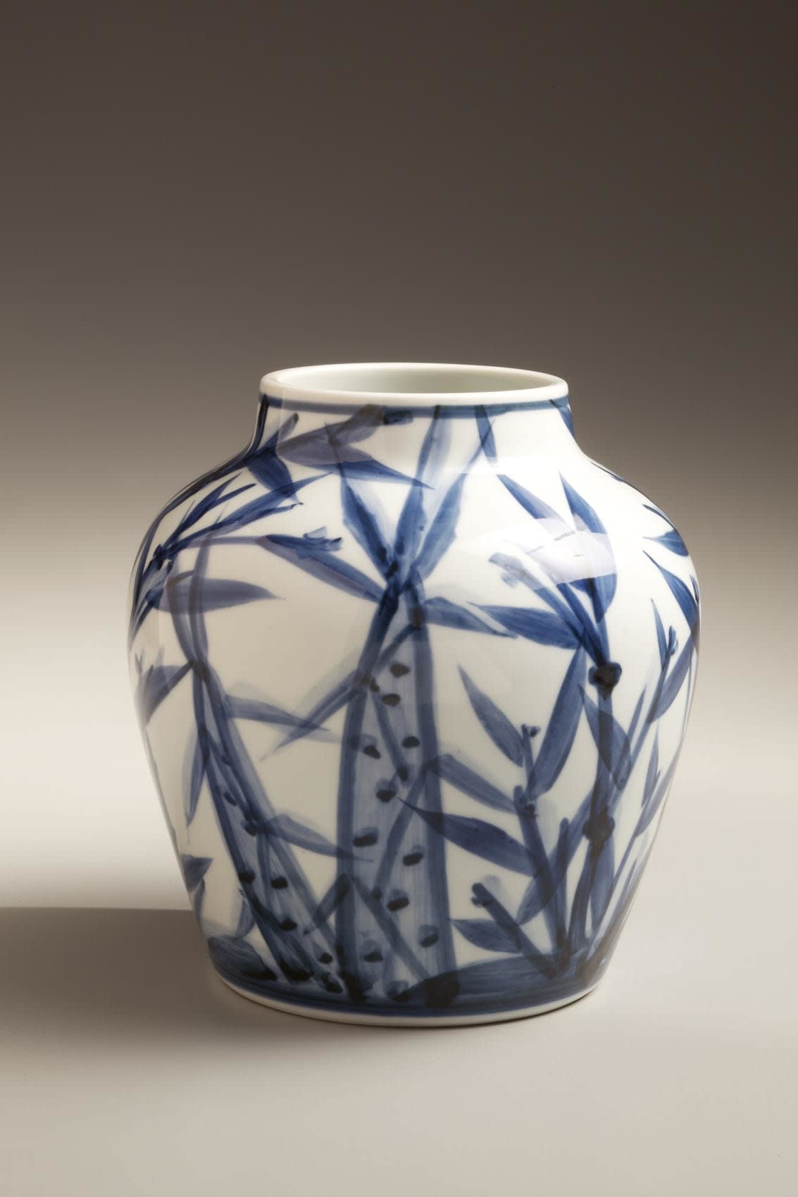 Kondô Yuzo (1902 - 1985) Glazed white porcelain vase with cobalt blue underglaze bamboo decoration, ca. 1977 Glazed Porcelain white cobalt blue underglaze 8 1/4 x 7 7/8 inches Inv# 6553 SOLD