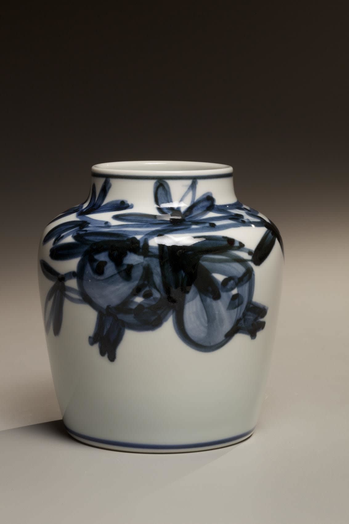Kondô Yuzo (1902 - 1985) White glazed porcelain vase with cobalt blue underglaze decoration of pomegranates ca. 1955 Glazed Porcelain 6 1/2 x 6 inches; Inv# 6707 SOLD