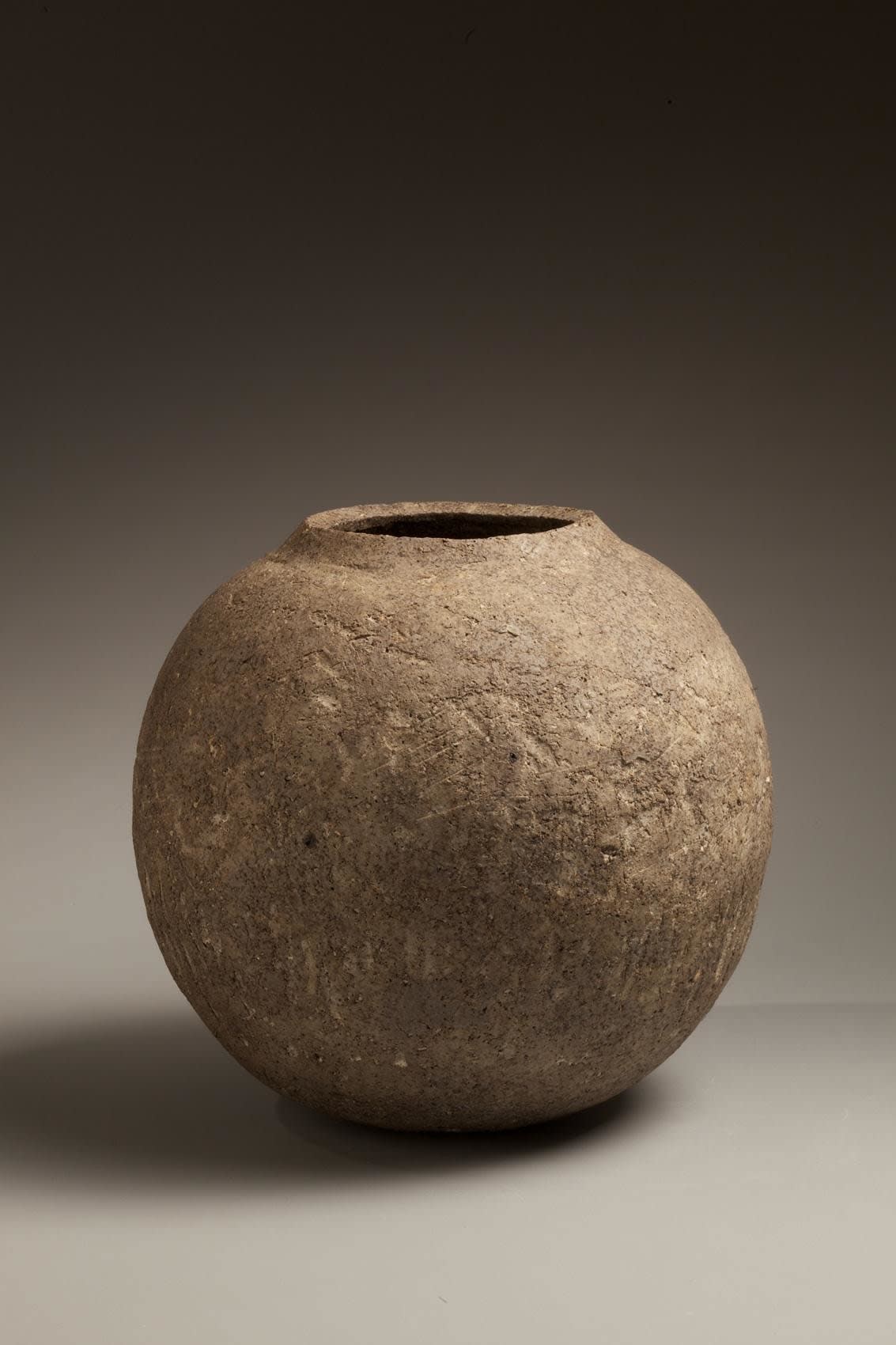 Kamoda Shoji (1933-1983) Spherical stoneware acid-etched vase, 1967 Unglazed stoneware 10 x 12 inches Inv# 6855 SOLD