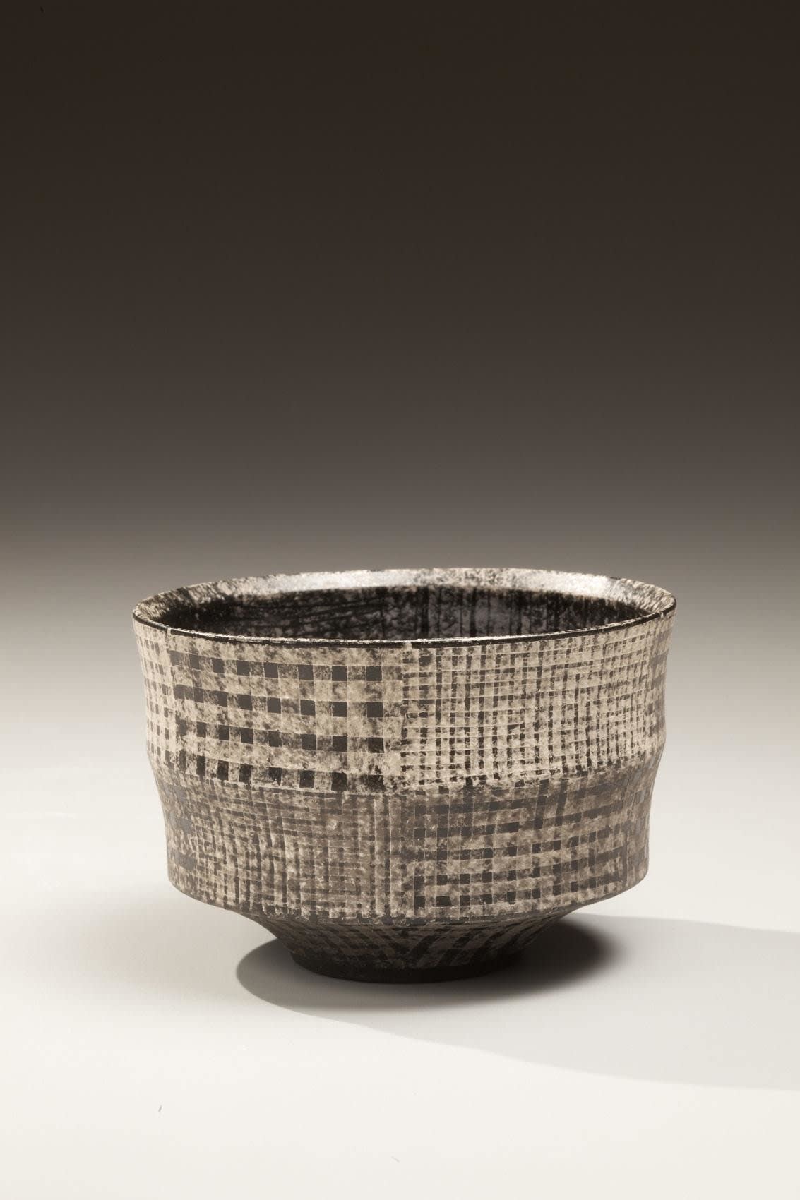 Maeda Masahiro (b. 1948) Tea bowl with black and white checkered pattern, 2010 Stoneware with black, silver and white glazes; 3 x 4 1/2 inches Inv# 6758