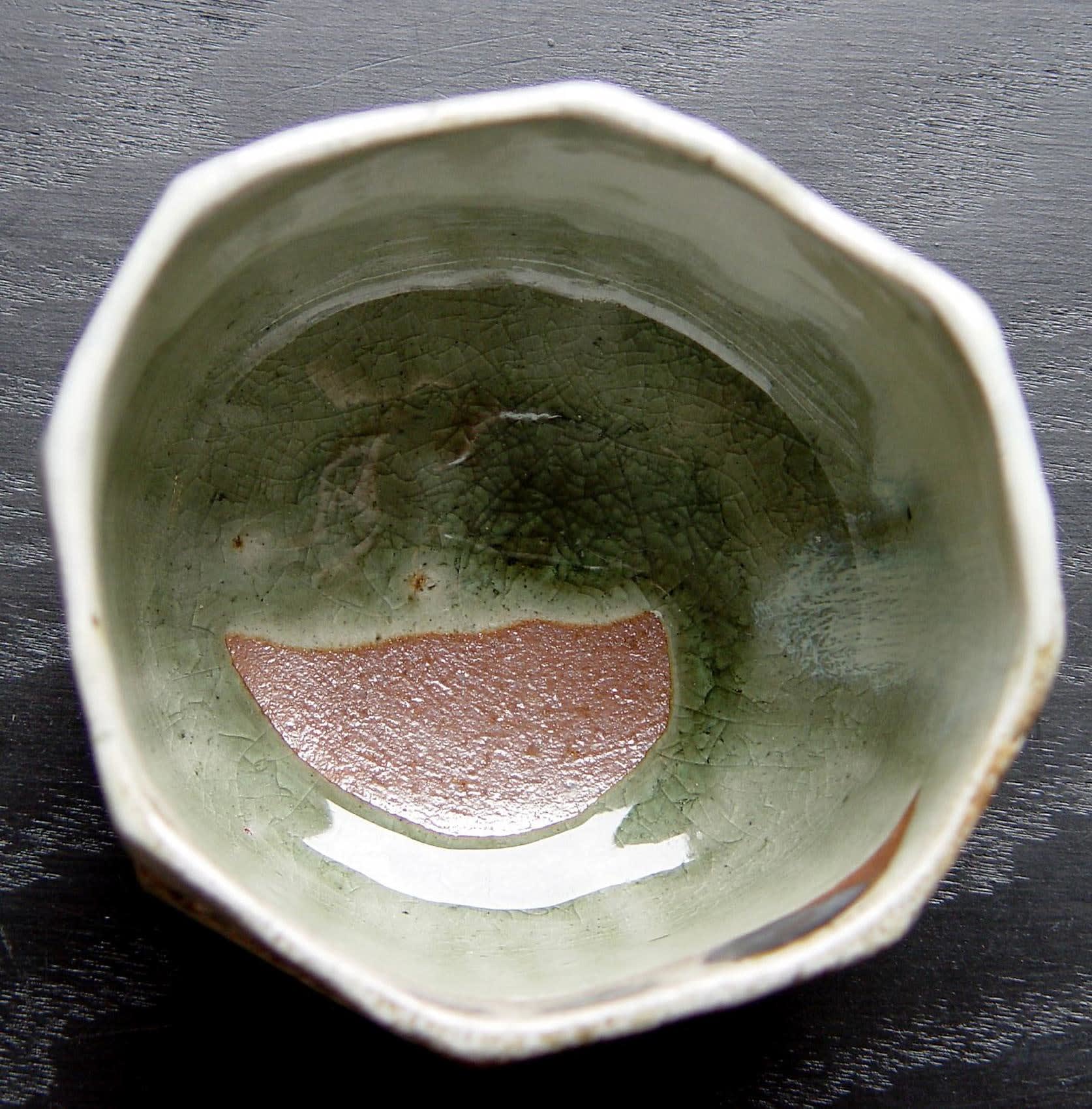 Tanba ware glazed tea bowl with faceted carved exterior 2008 Wood-fired stoneware with natural ash glaze 4 x 5 x 4 3/4 inches; Inv# 5595 SOLD