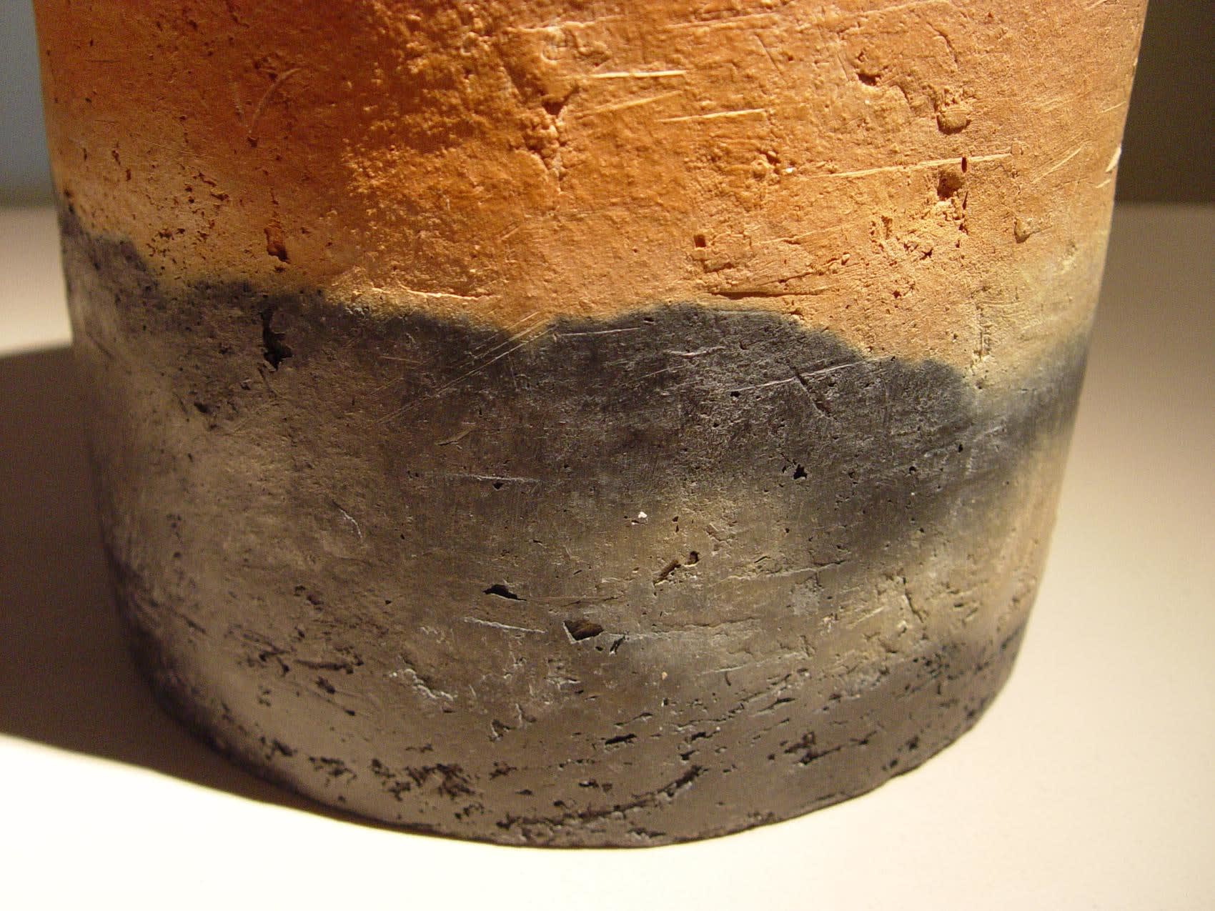 NAGASAWA SETSUKO (b. 1941) Cylindrical geometric form, ca. 2008 Smoke-infused orange terra-cotta clays 8 7/8 x 8 7/8 x 17 1/4 inches Inv# 7588