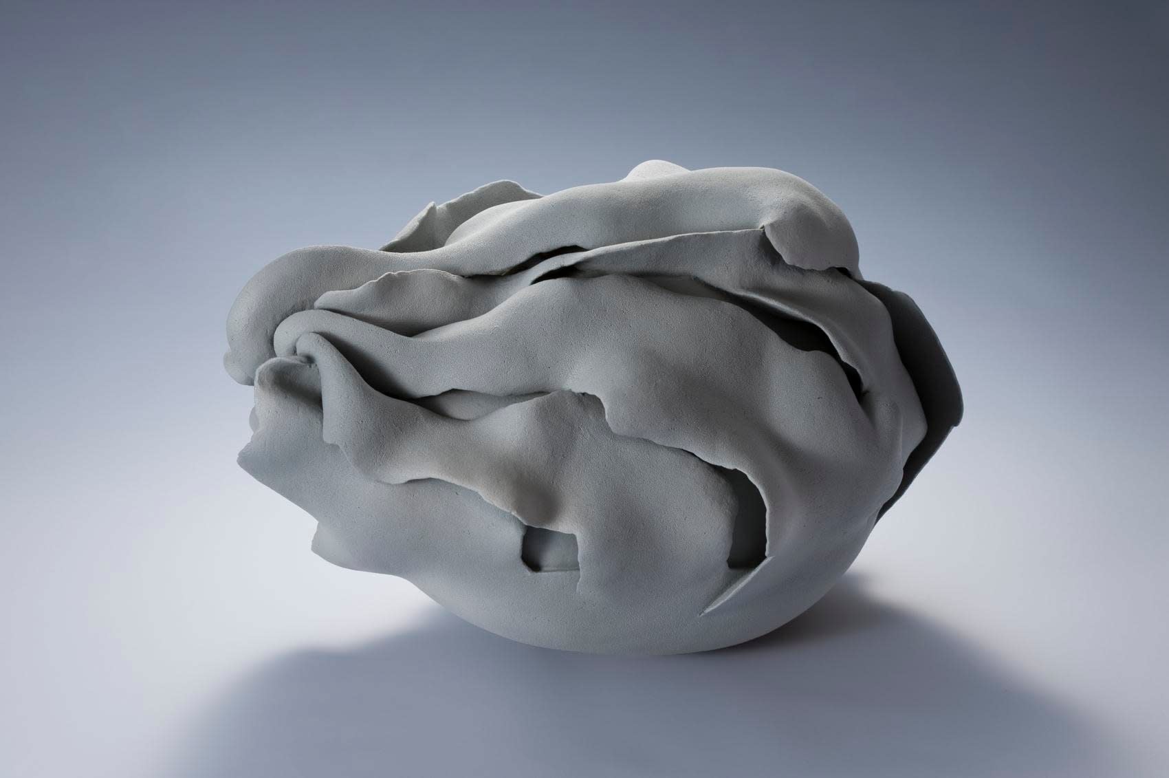A Moment in White - F, ca. 2012 Stoneware with grayish-white matte glaze 15 x 22 1/2 x 16 1/2 inches Inv# 7731 SOLD