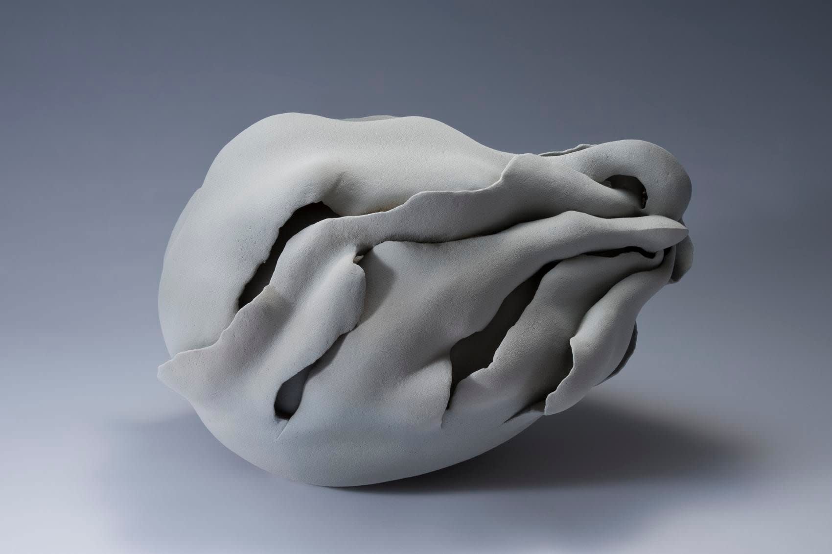 A Moment in White - F, ca. 2012 Stoneware with grayish-white matte glaze 15 x 22 1/2 x 16 1/2 inches Inv# 7731 SOLD