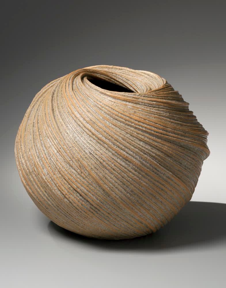 Large swirling vessel with diagonally incised linear patterning with orange edges, 2013 Stoneware with sand glaze 14 1/2 x 18 1/4 x 18 5/8 in. Inv# 8535 SOLD
